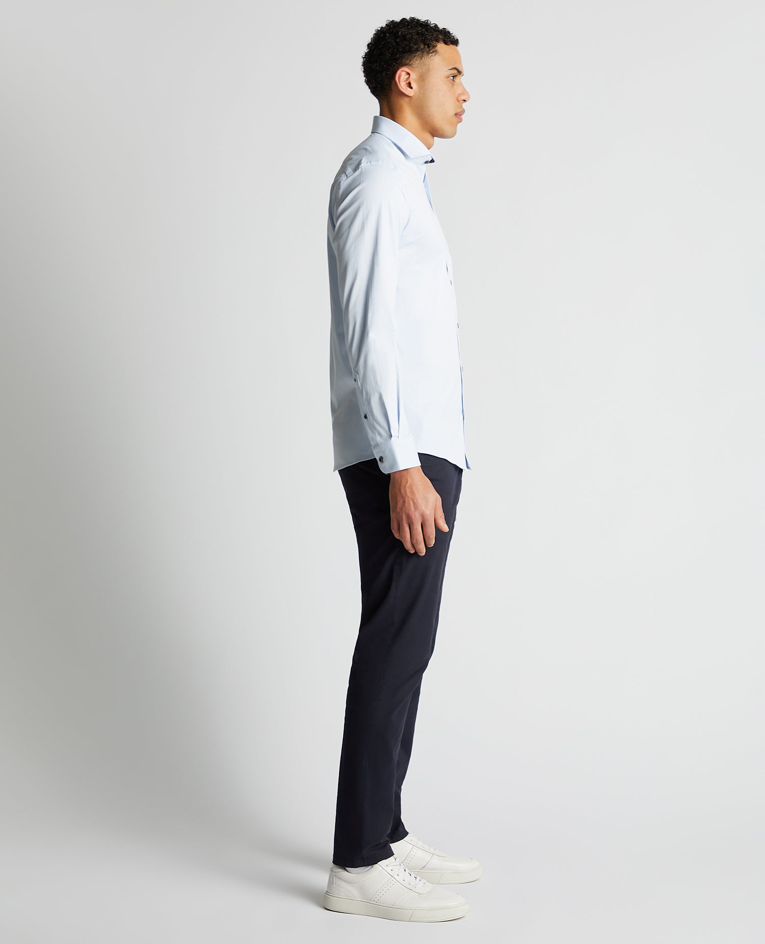 Man wearing a blue Tapered Fit Cotton-Blend Stretch Shirt