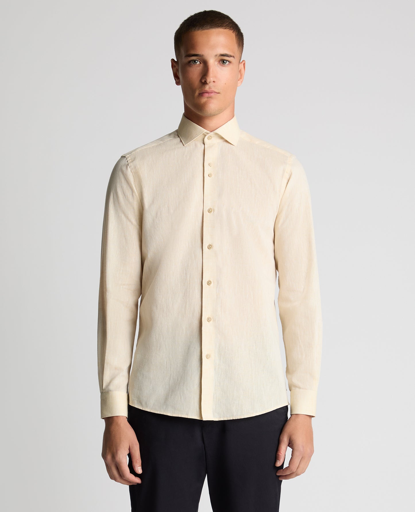 Man wearing a orange Tapered Fit Cotton-Linen Blend Shirt