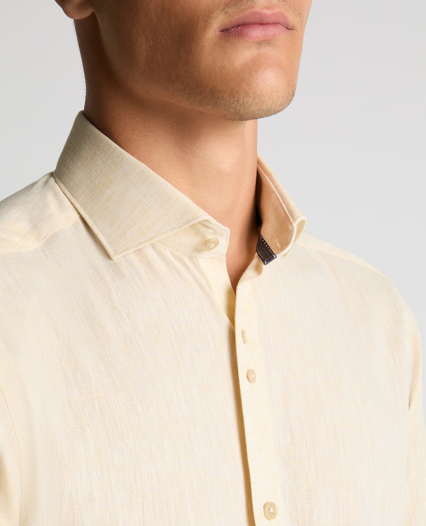 Man wearing a orange Tapered Fit Cotton-Linen Blend Shirt