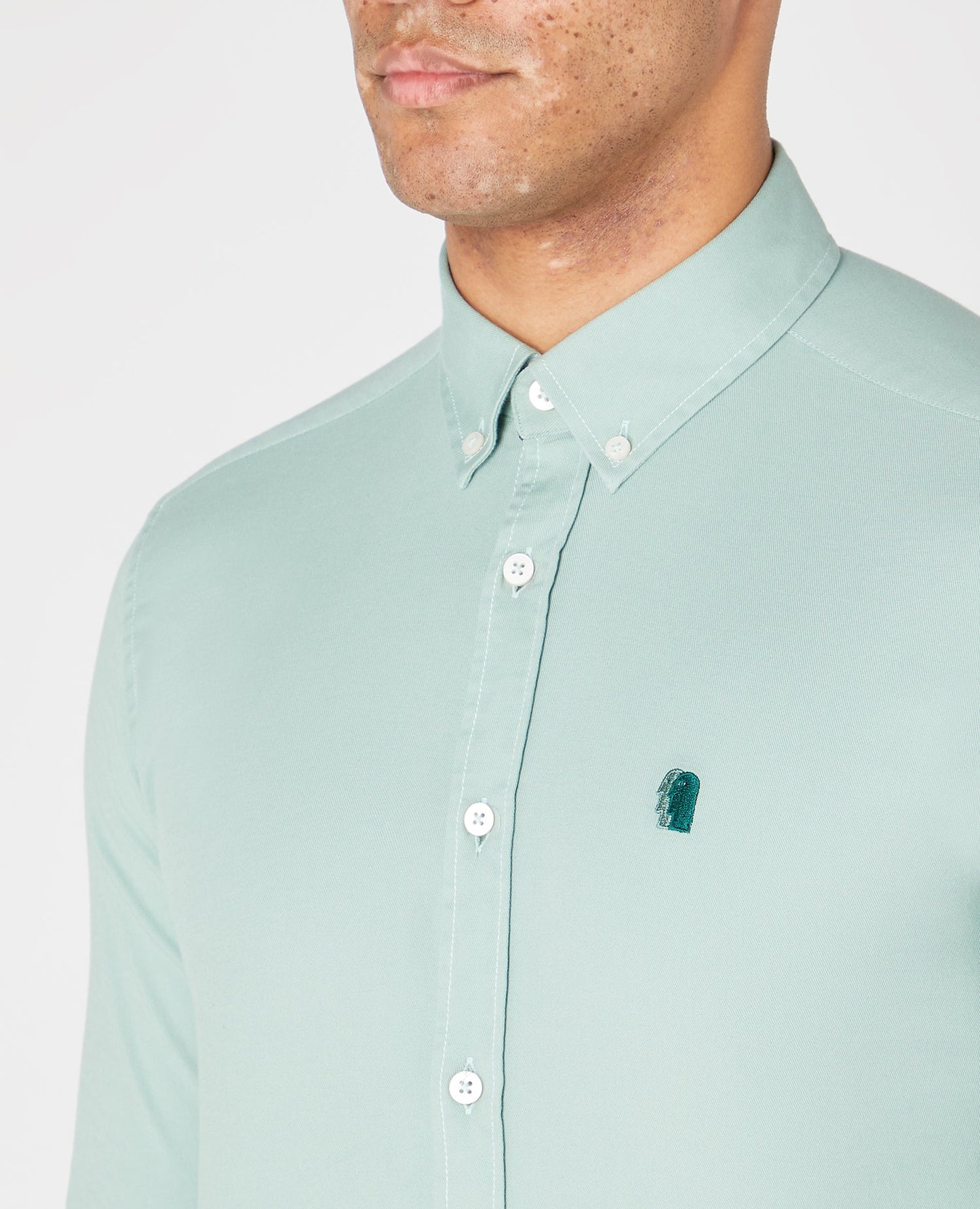 Man wearing a green Slim Fit Cotton Stretch Shirt