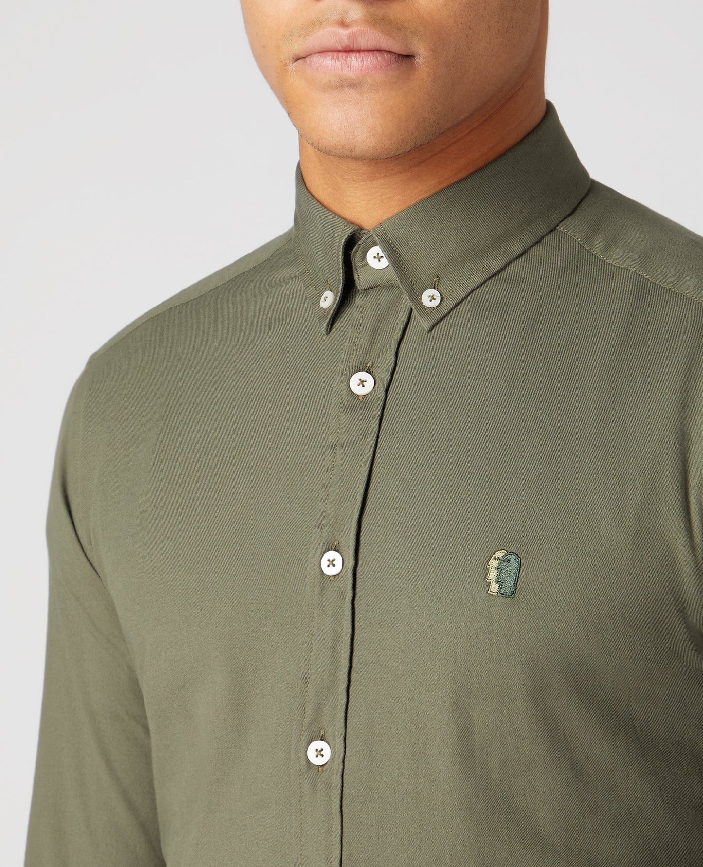 Man wearing a green Slim Fit Cotton Stretch Shirt