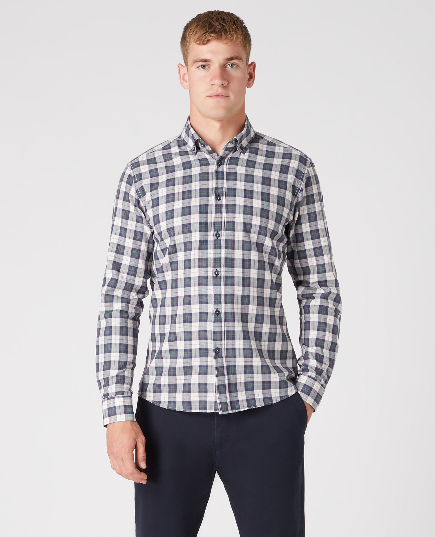 Man wearing a green Tapered Fit Check Cotton Shirt