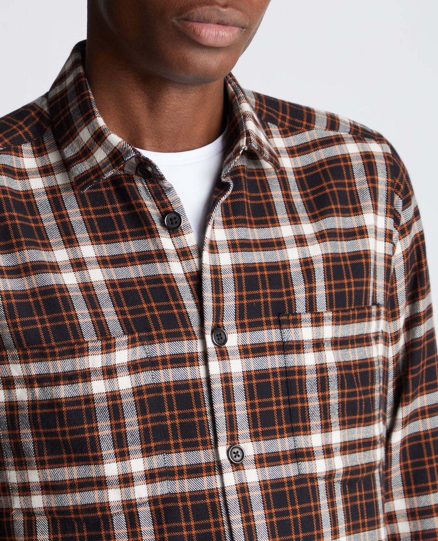 Man wearing a black Regular Fit Checked Cotton Overshirt