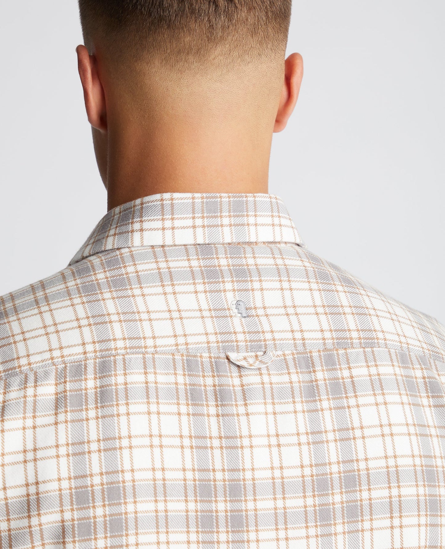 Man wearing a sand Regular Fit Checked Cotton Overshirt