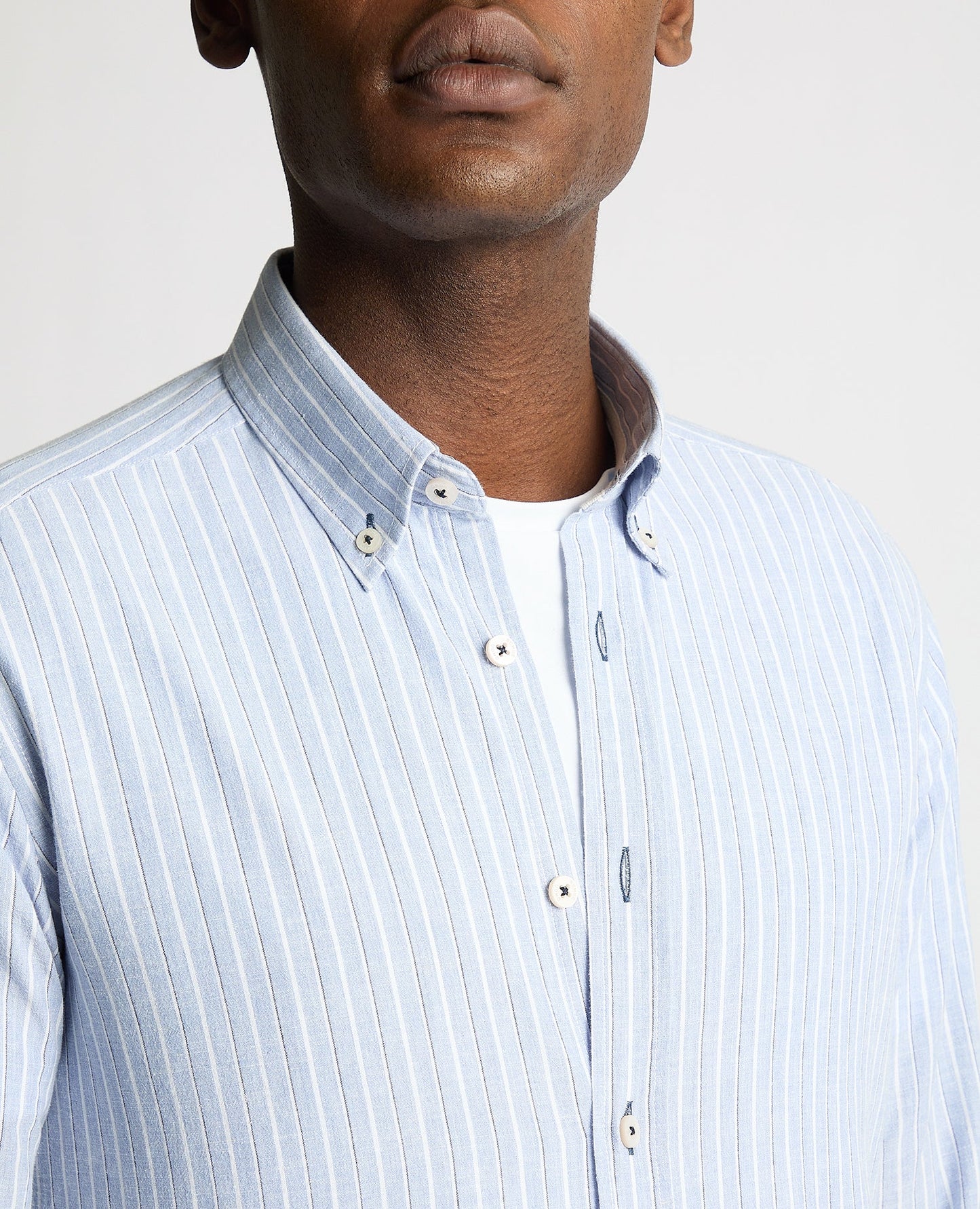 Man wearing a blue Slim Fit Pinstripe Cotton Linen Mix Shirt