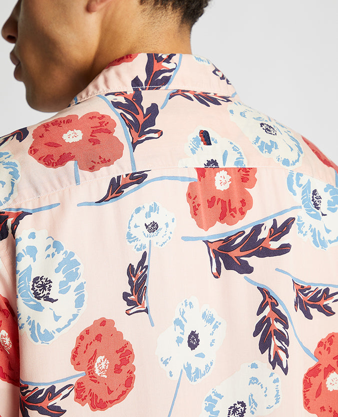 Man wearing a red Tapered Fit Cotton Short Sleeve Floral Shirt