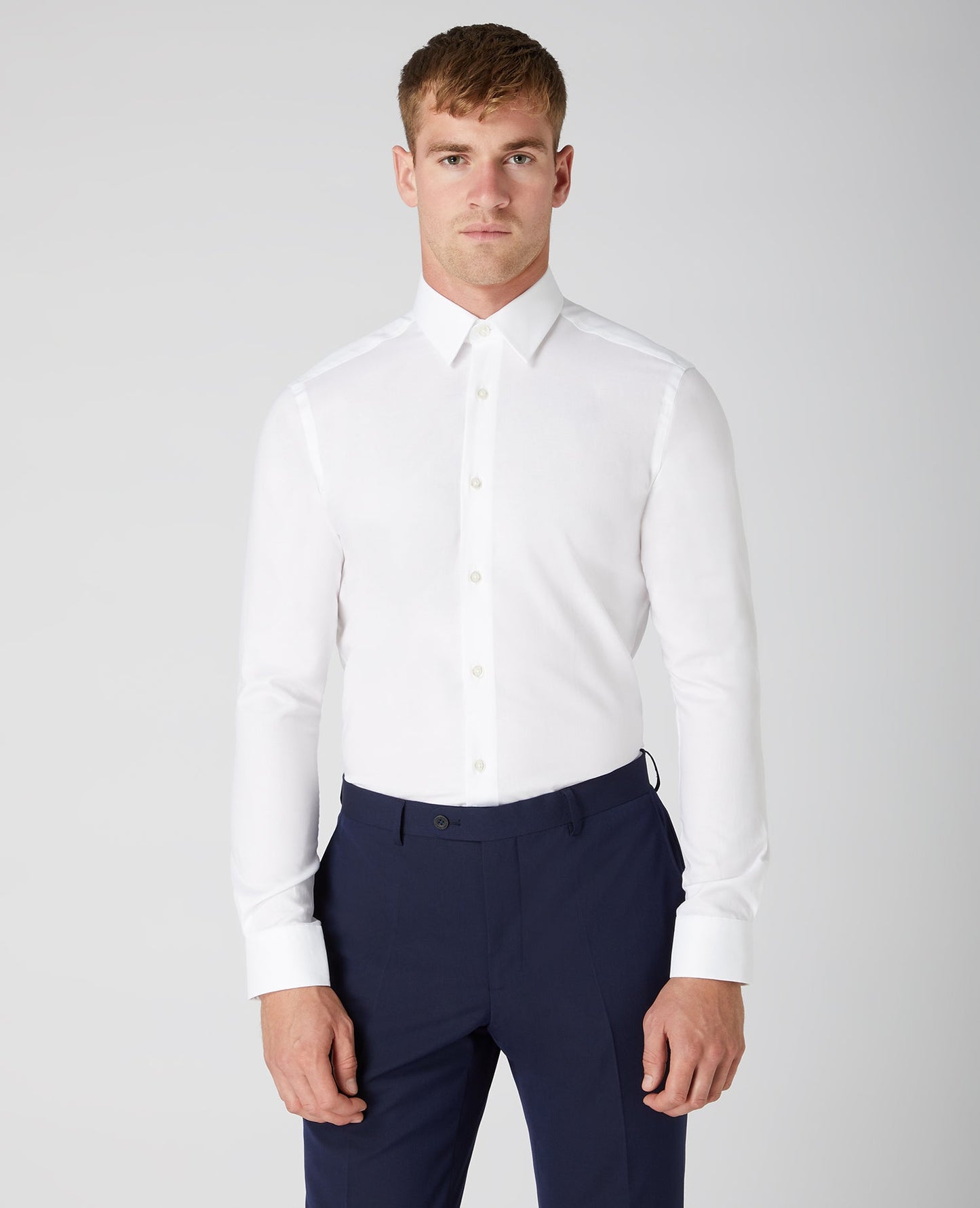 Man wearing a white Slim Fit Cotton Oxford Shirt