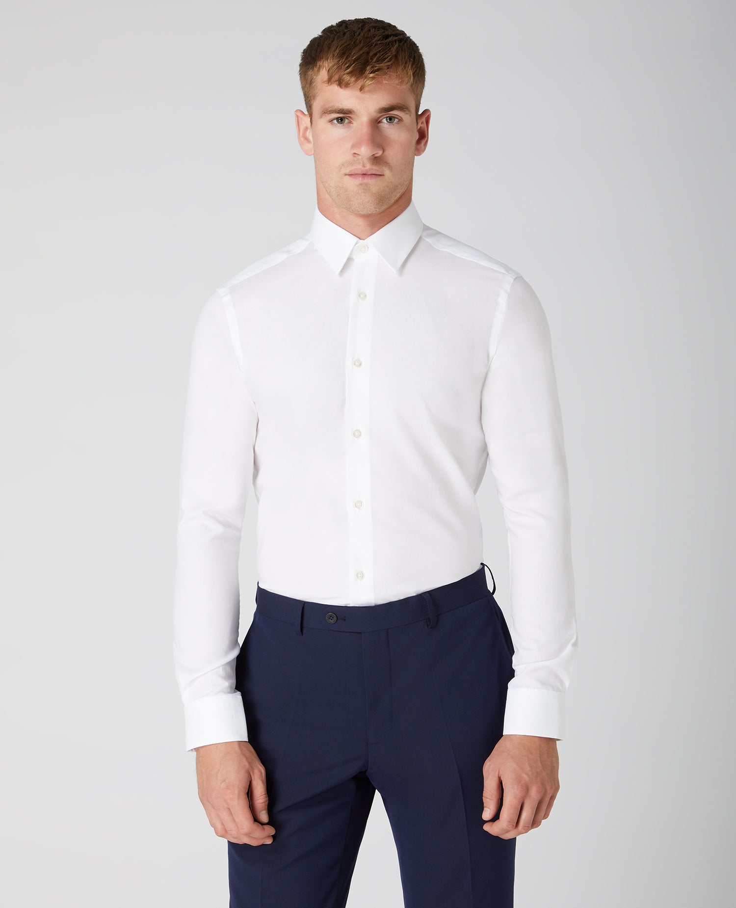 Man wearing a white Slim Fit Cotton Oxford Shirt