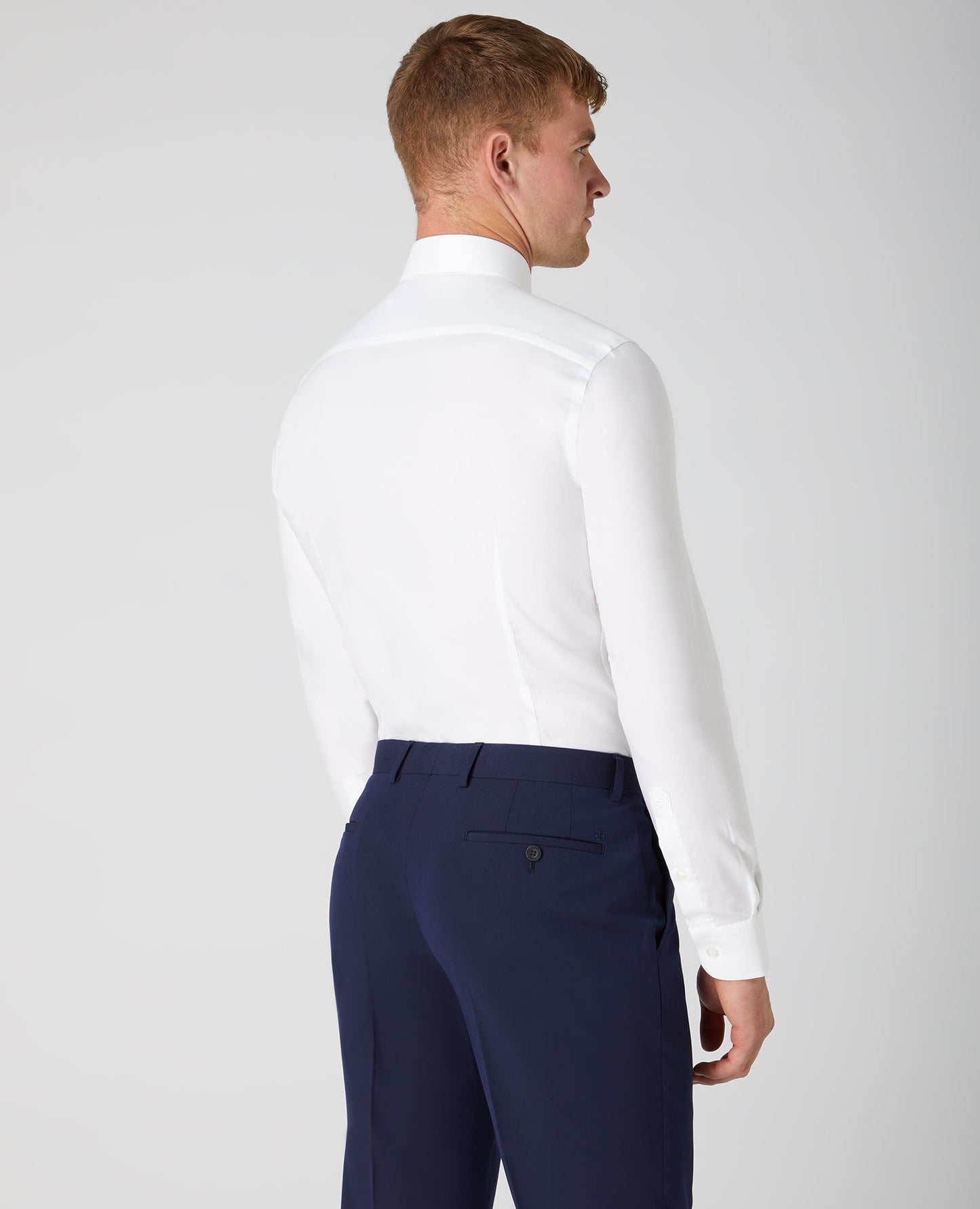 Man wearing a white Slim Fit Cotton Oxford Shirt