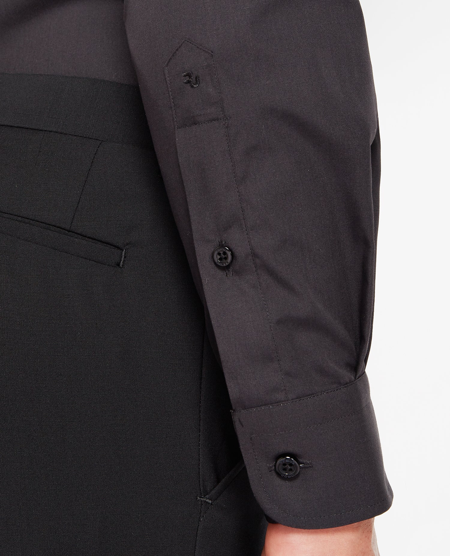 Man wearing a black Tapered Fit Cotton-Blend Shirt