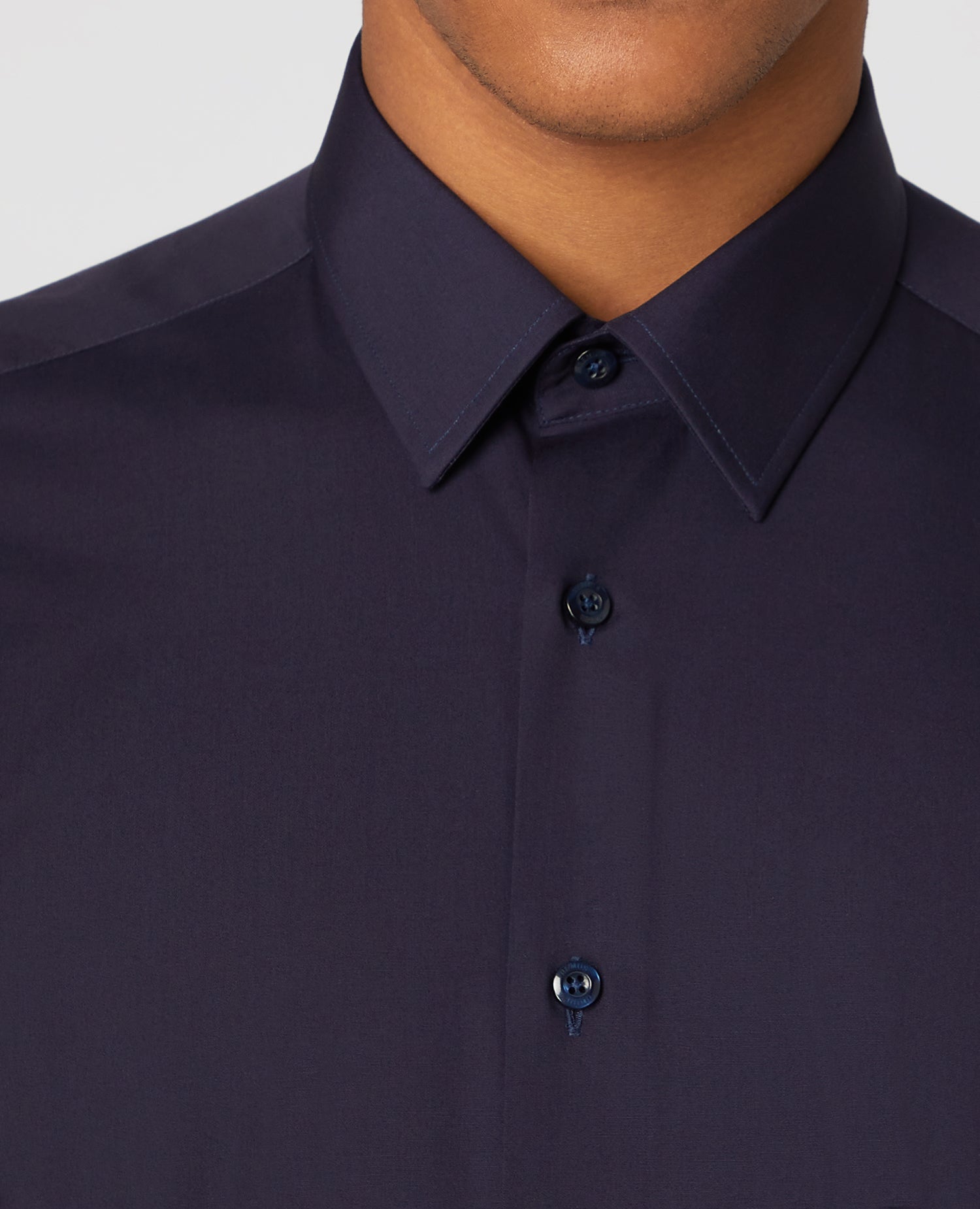 Man wearing a navy Slim Fit Cotton-Blend Shirt