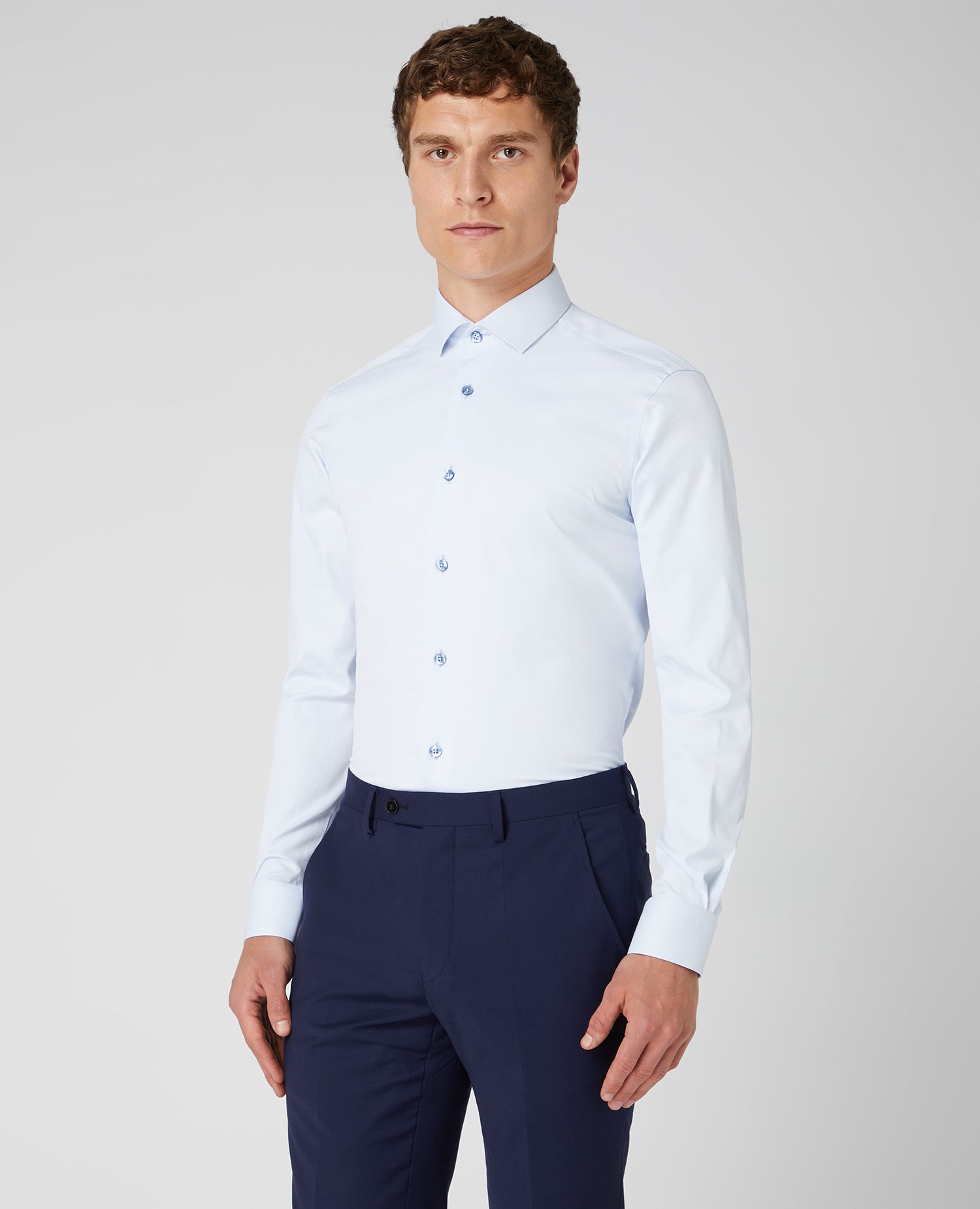 Man wearing a blue Slim Fit Cotton Stretch Shirt