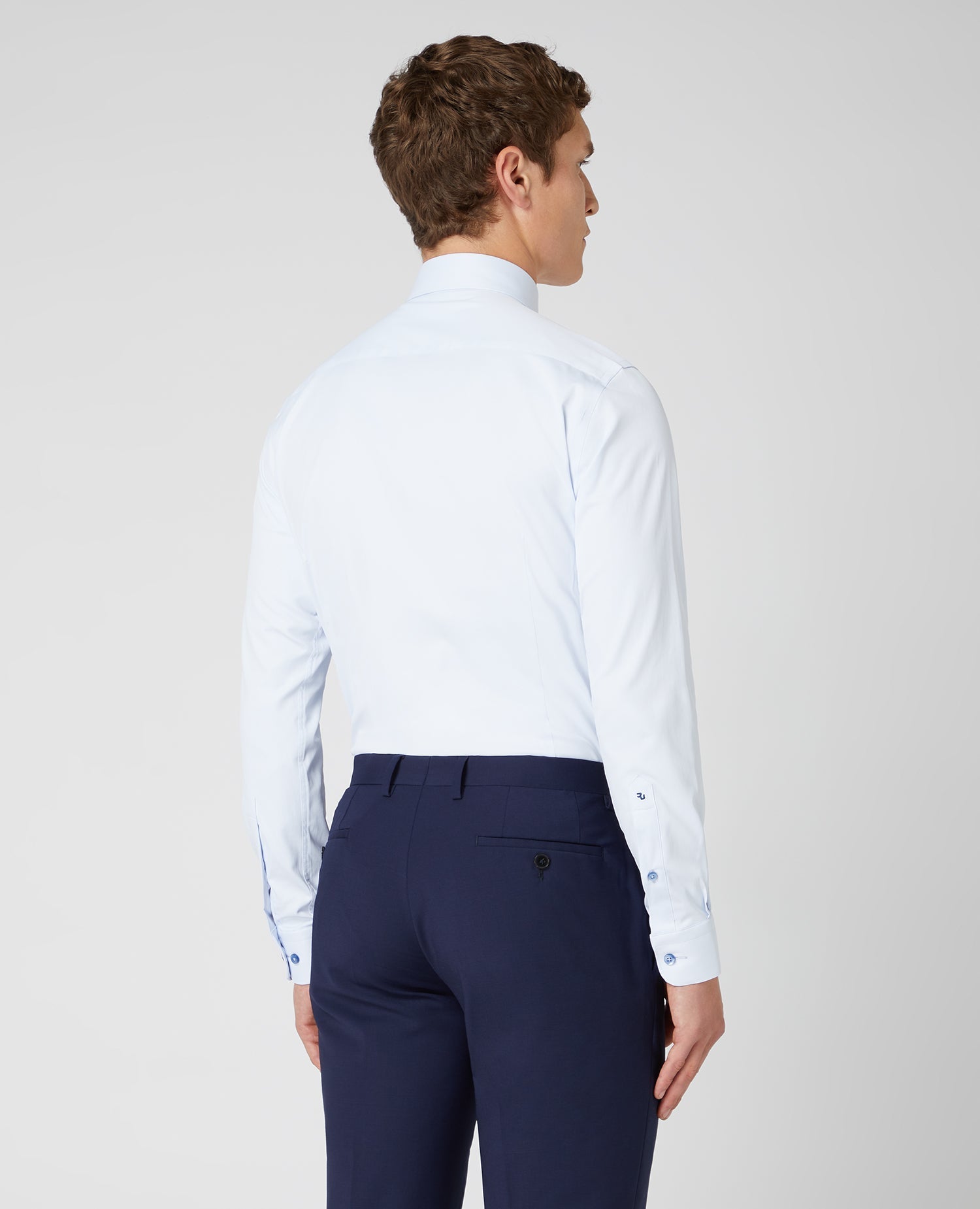Man wearing a blue Slim Fit Cotton Stretch Shirt