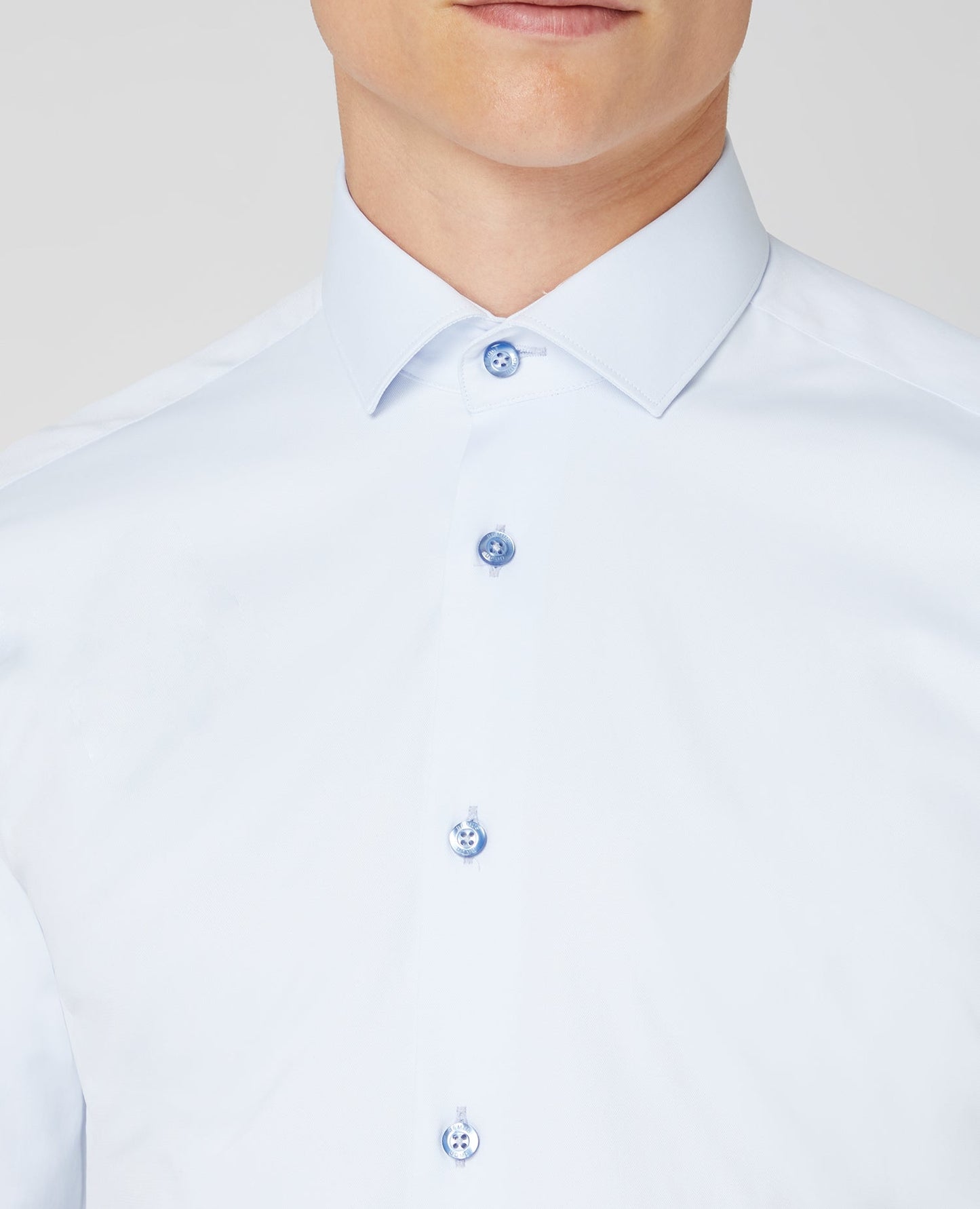 Man wearing a blue Slim Fit Cotton Stretch Shirt