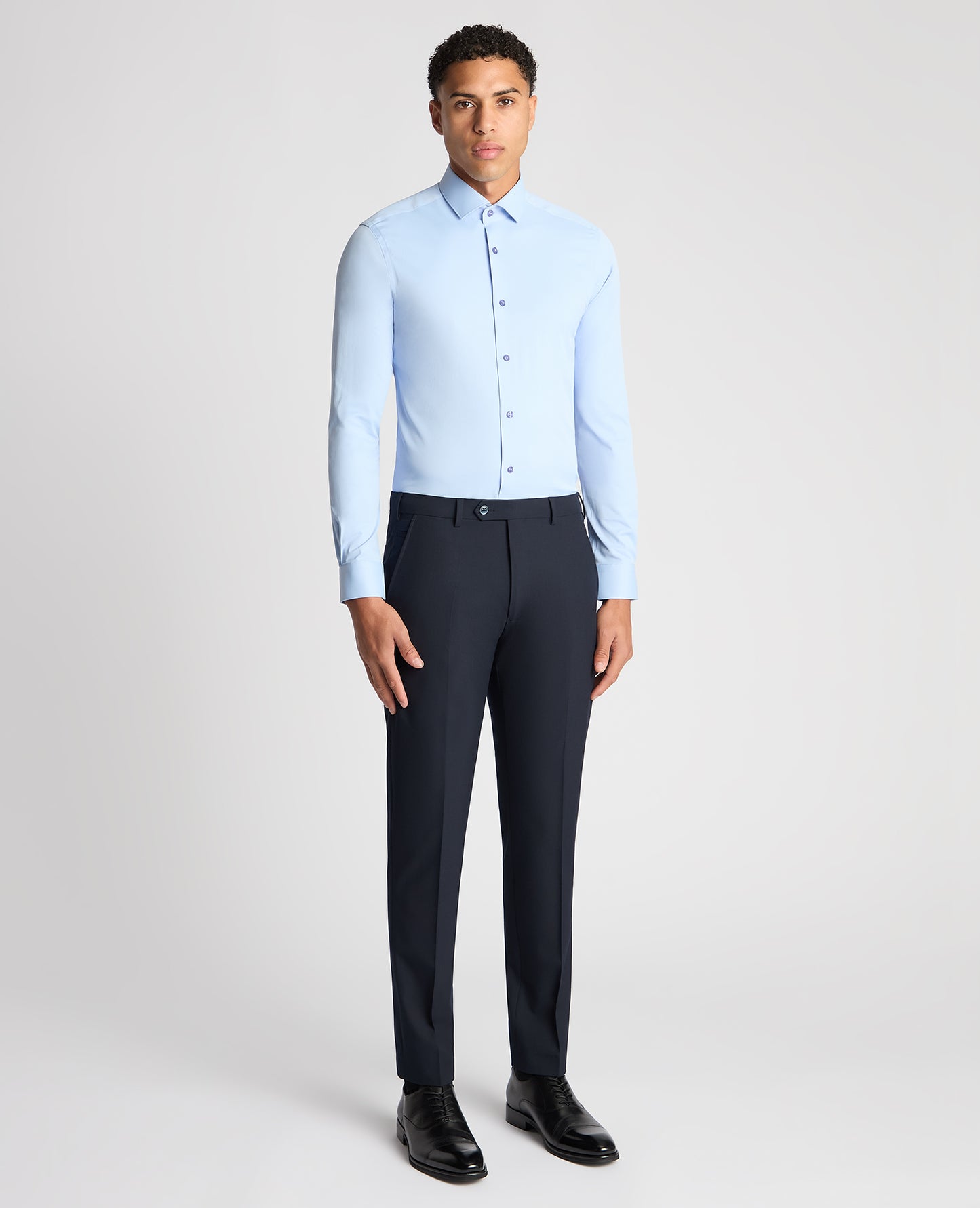 Man wearing a blue Slim Fit Cotton Stretch Shirt