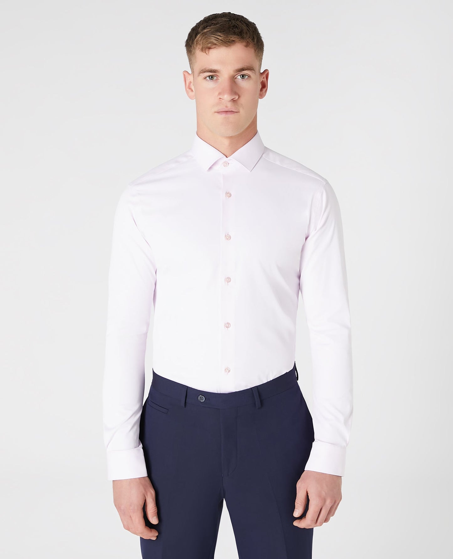 Man wearing a pink Slim Fit Cotton Stretch Shirt