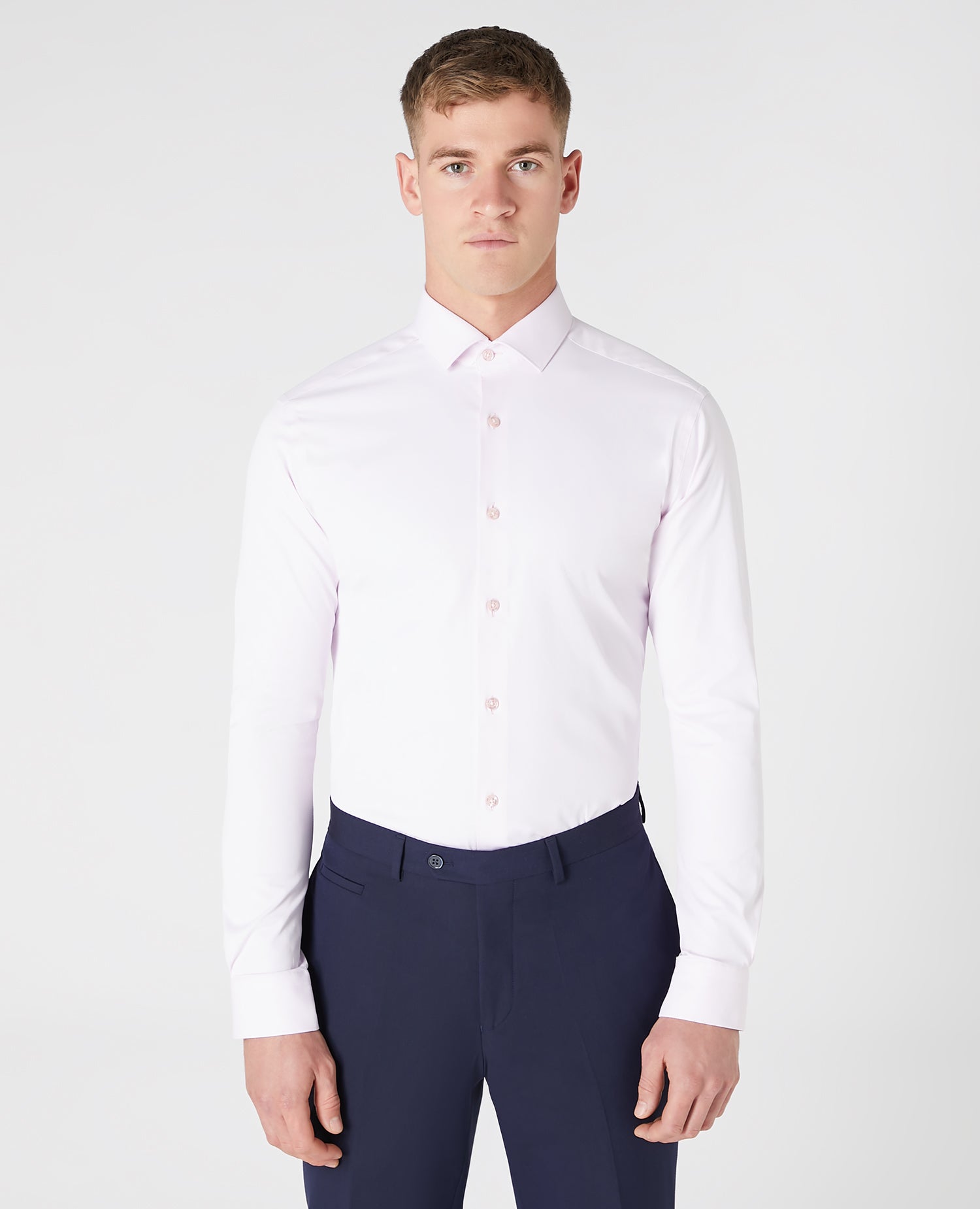 Man wearing a pink Slim Fit Cotton Stretch Shirt