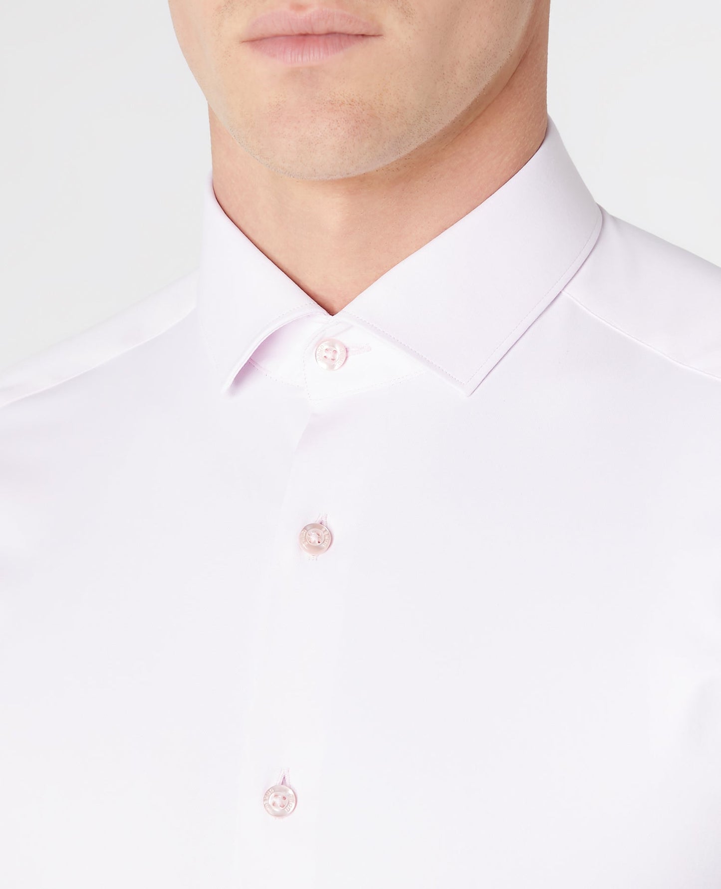 Man wearing a pink Slim Fit Cotton Stretch Shirt