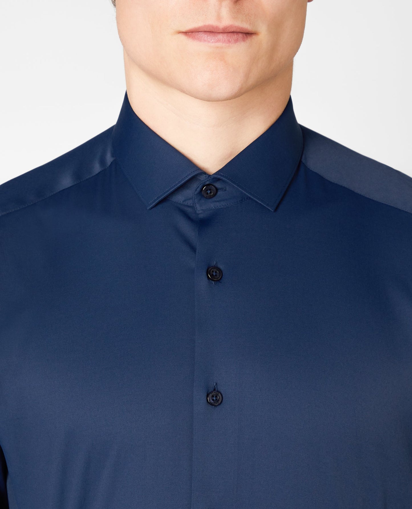 Man wearing a navy Slim Fit Cotton Stretch Shirt