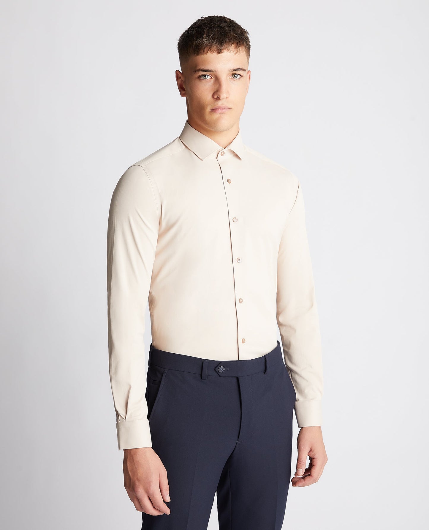 Man wearing a sand Slim Fit Cotton Stretch Shirt