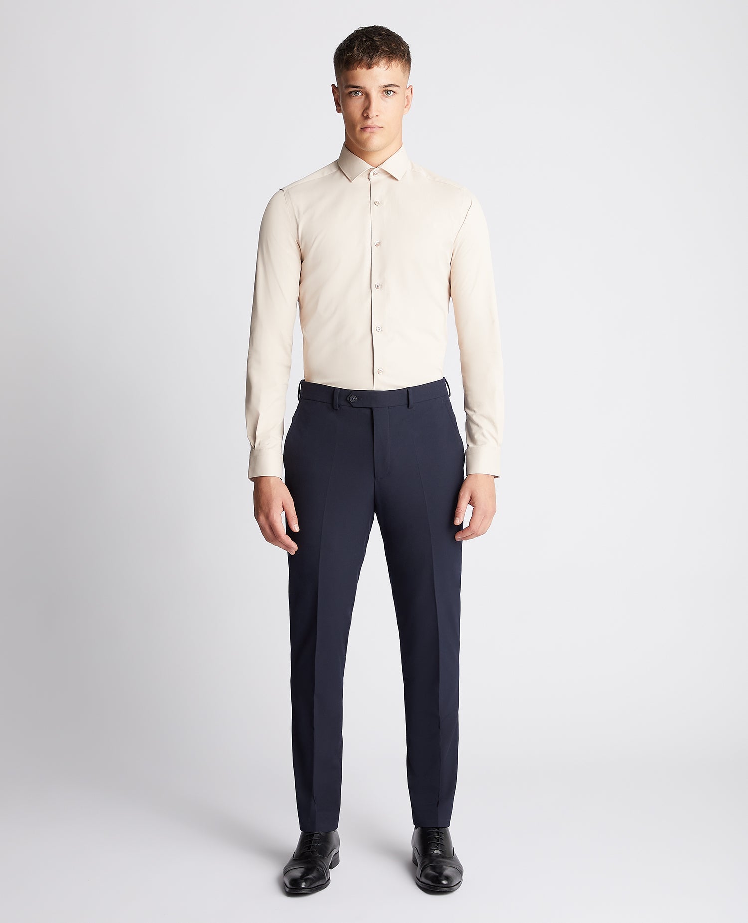 Man wearing a sand Slim Fit Cotton Stretch Shirt