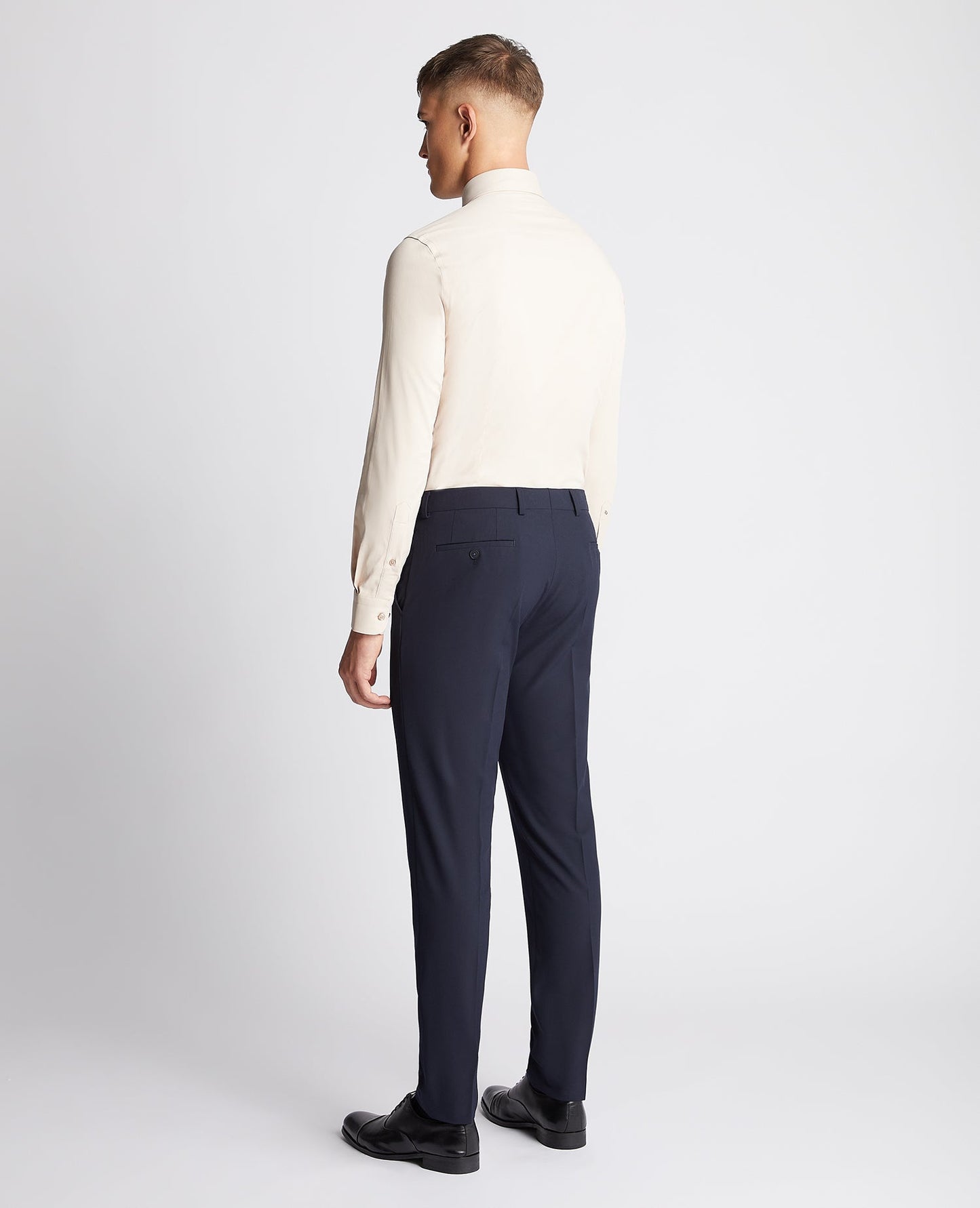 Man wearing a sand Slim Fit Cotton Stretch Shirt