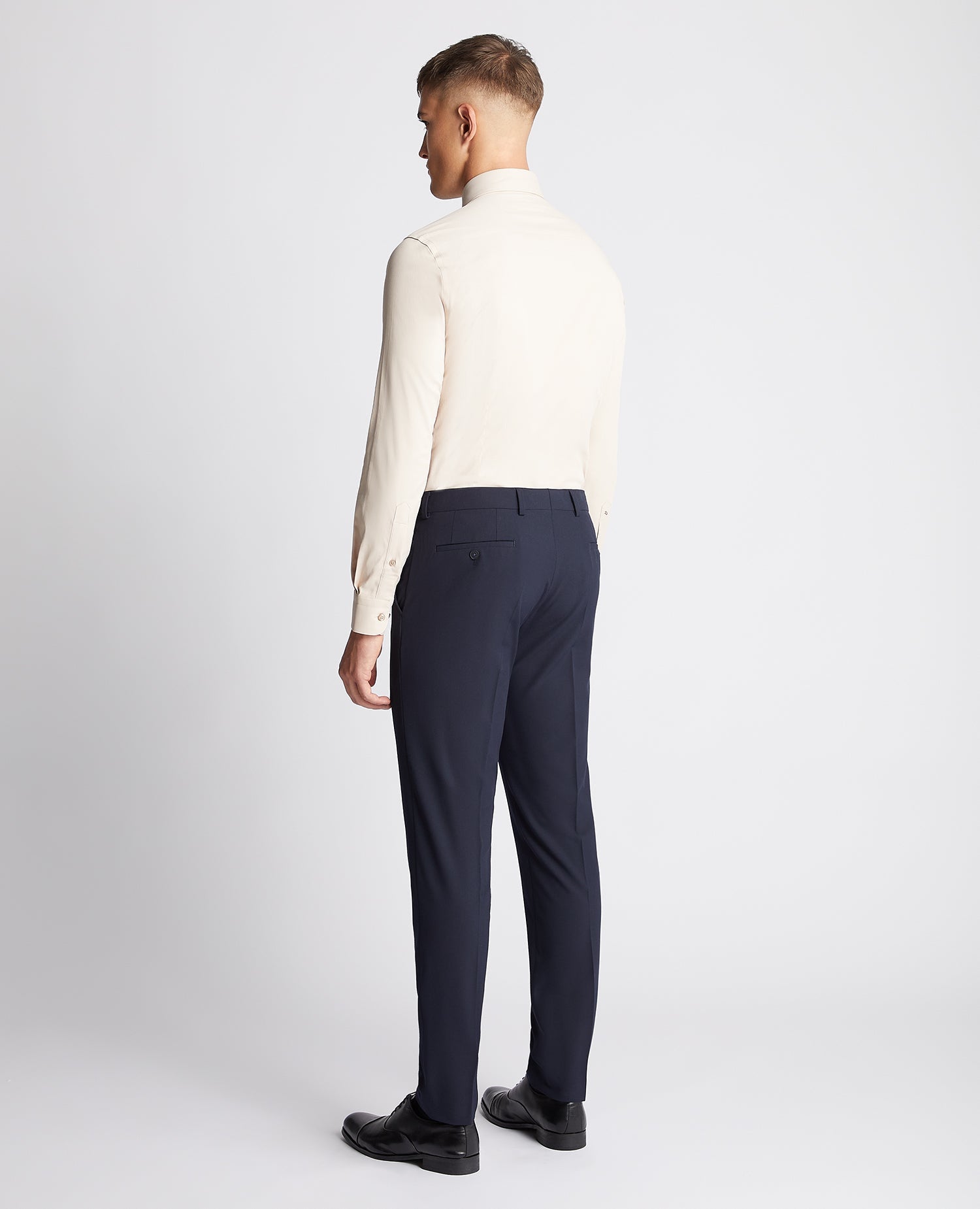 Man wearing a sand Slim Fit Cotton Stretch Shirt