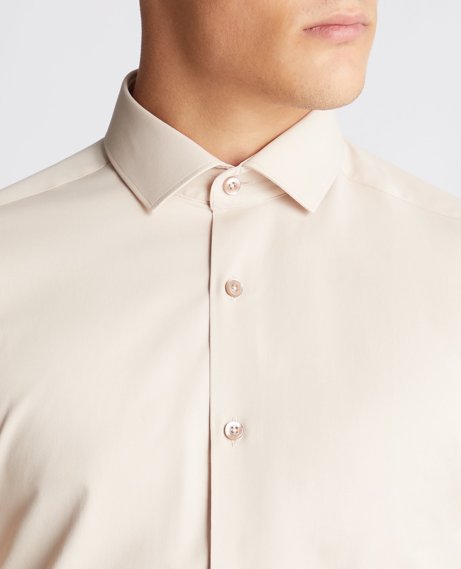 Man wearing a sand Slim Fit Cotton Stretch Shirt