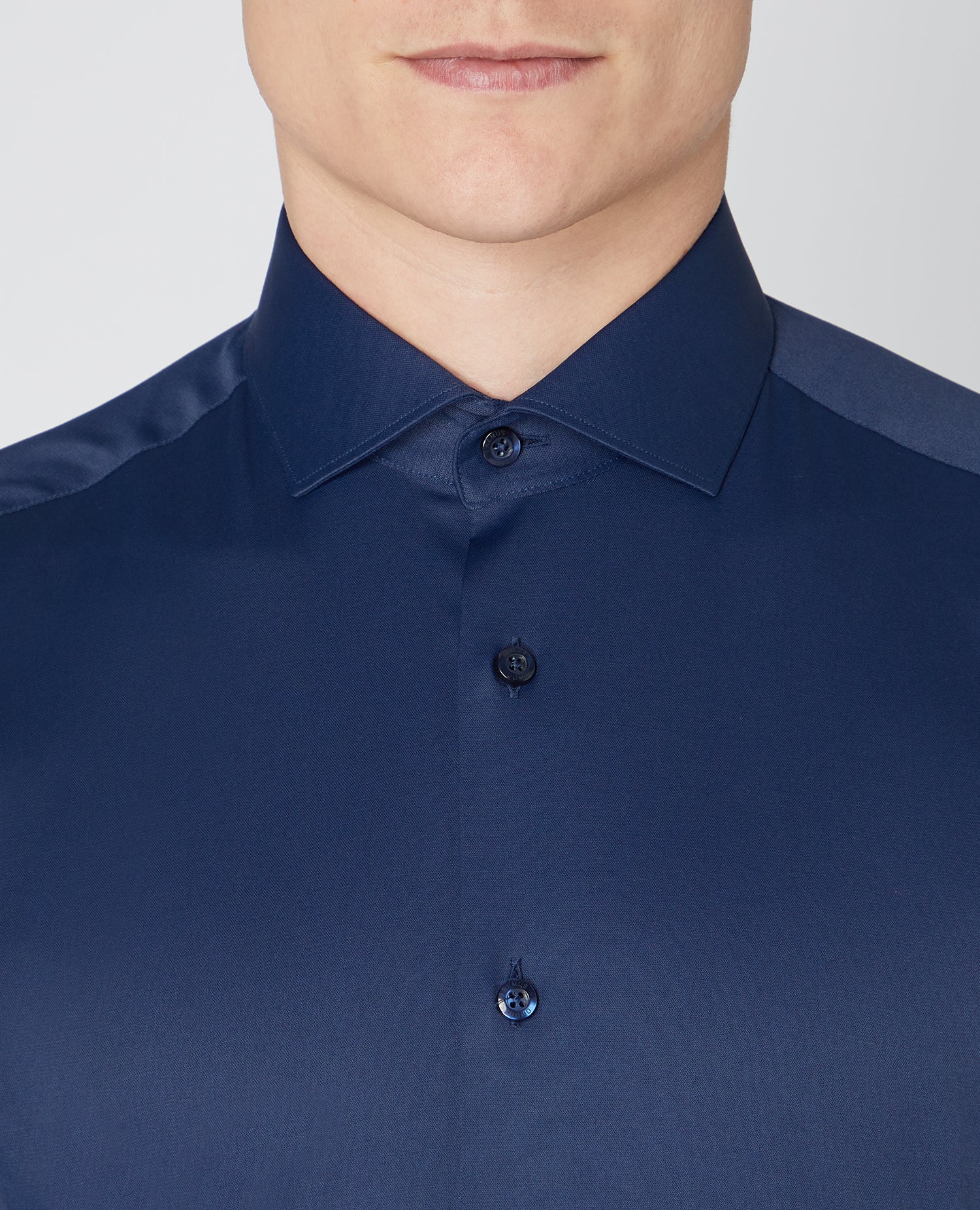 Man wearing a navy Tapered Fit Cotton Stretch Shirt