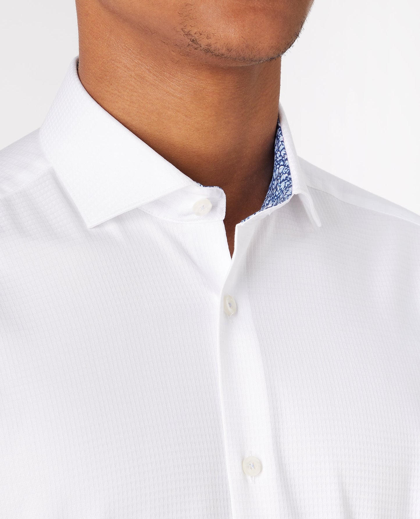 Man wearing a white Tapered Fit Cotton Shirt