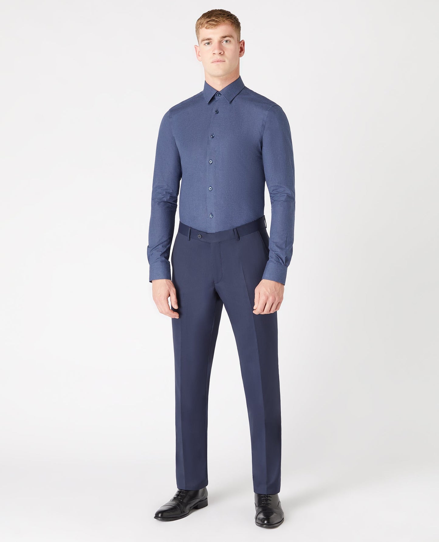 Man wearing a navy Slim fit cotton shirt