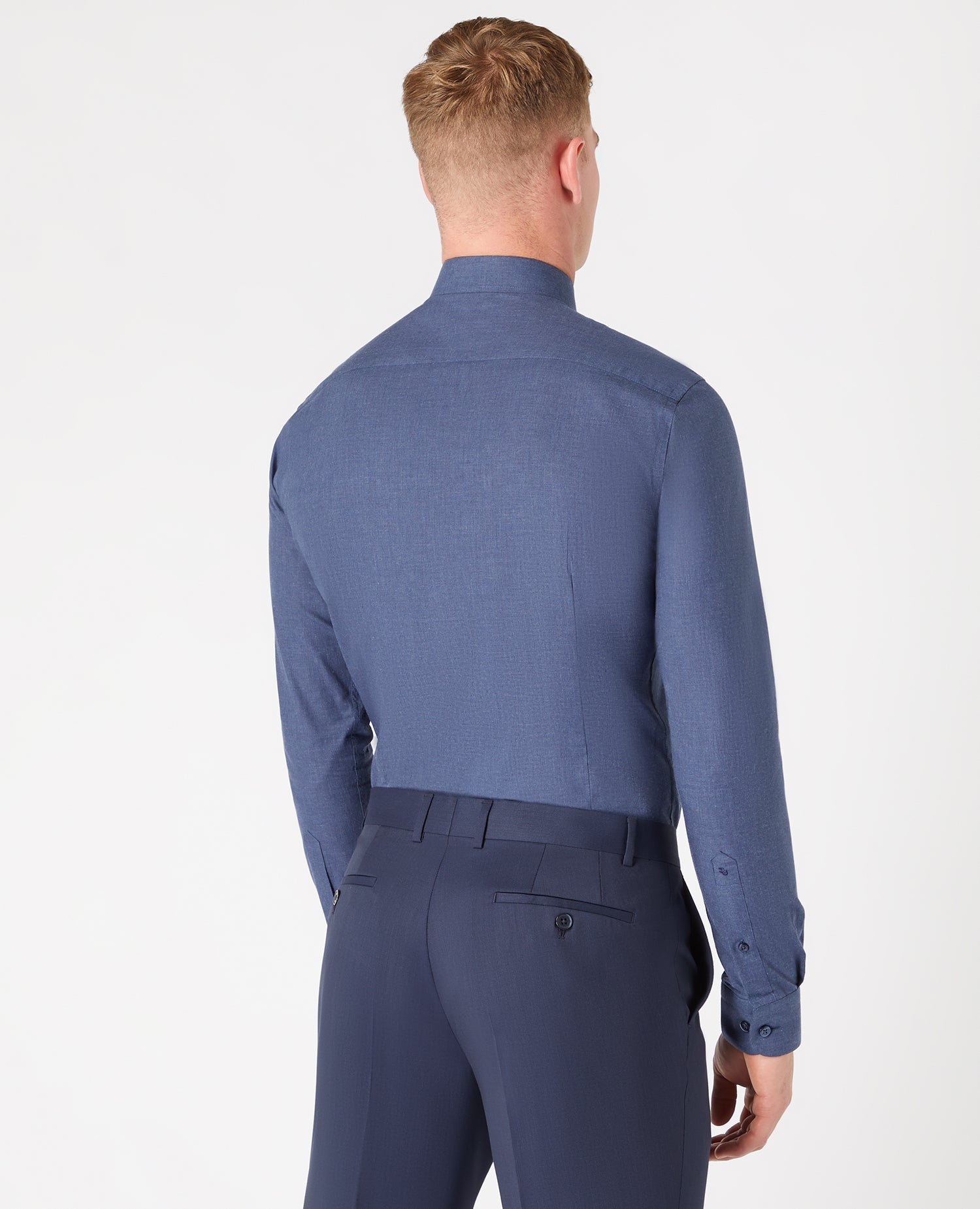 Man wearing a navy Slim fit cotton shirt