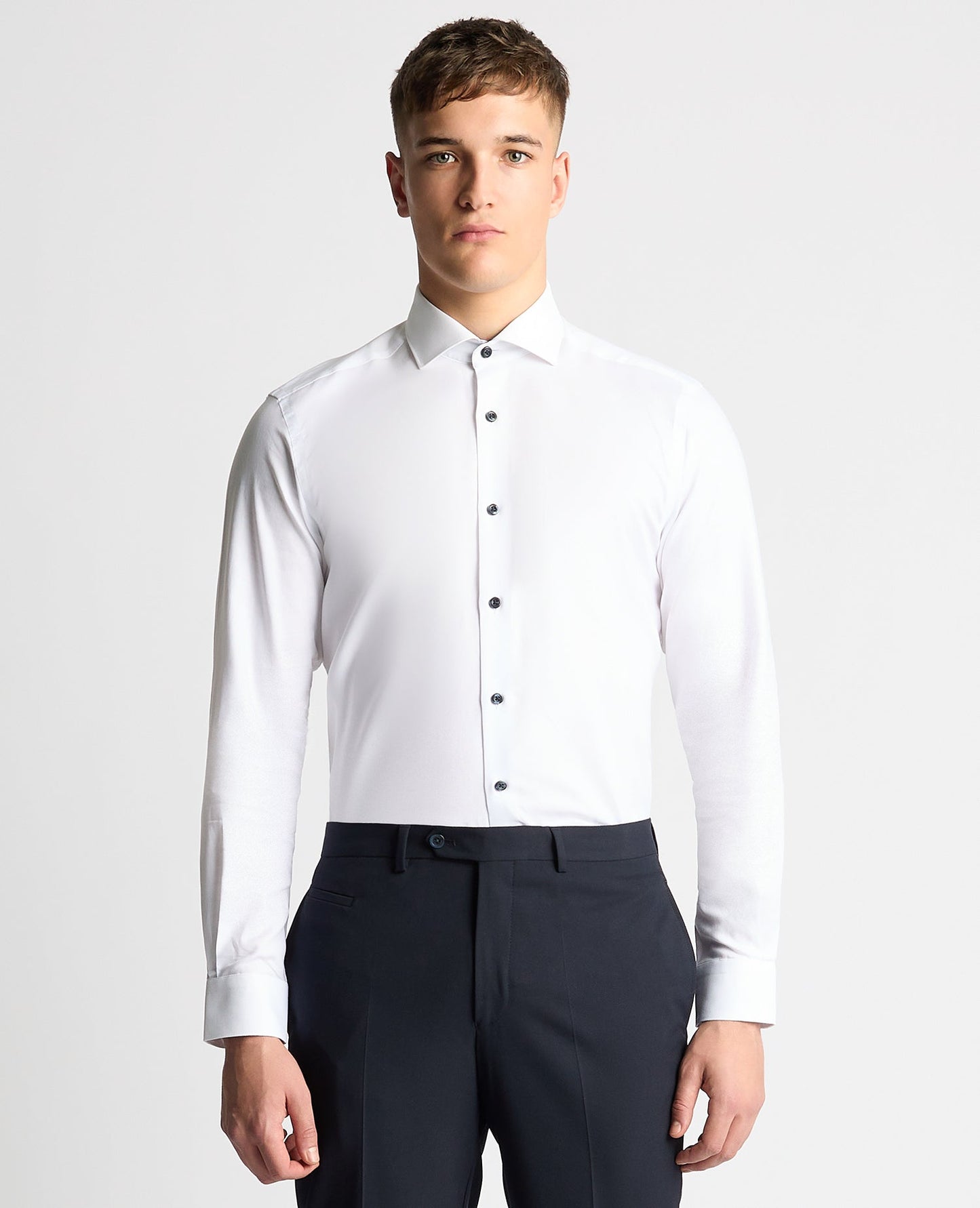 Man wearing a white Tapered Fit Jacquard Cotton Shirt
