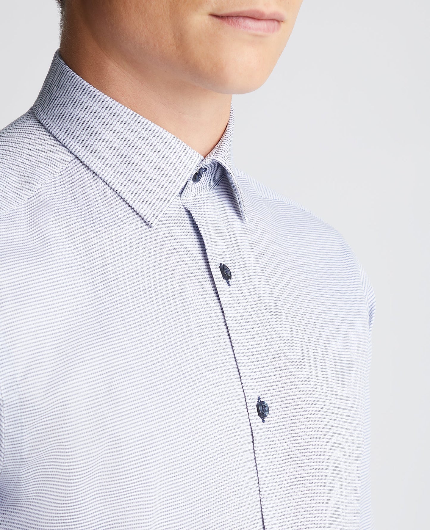 Man wearing a blue Tapered Fit Cotton Woven Shirt