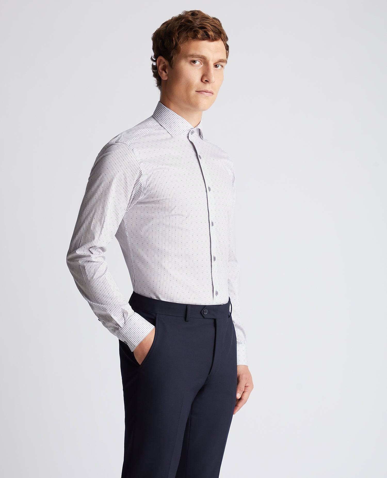 Man wearing a grey Tapered Fit Striped Cotton-Stretch Shirt