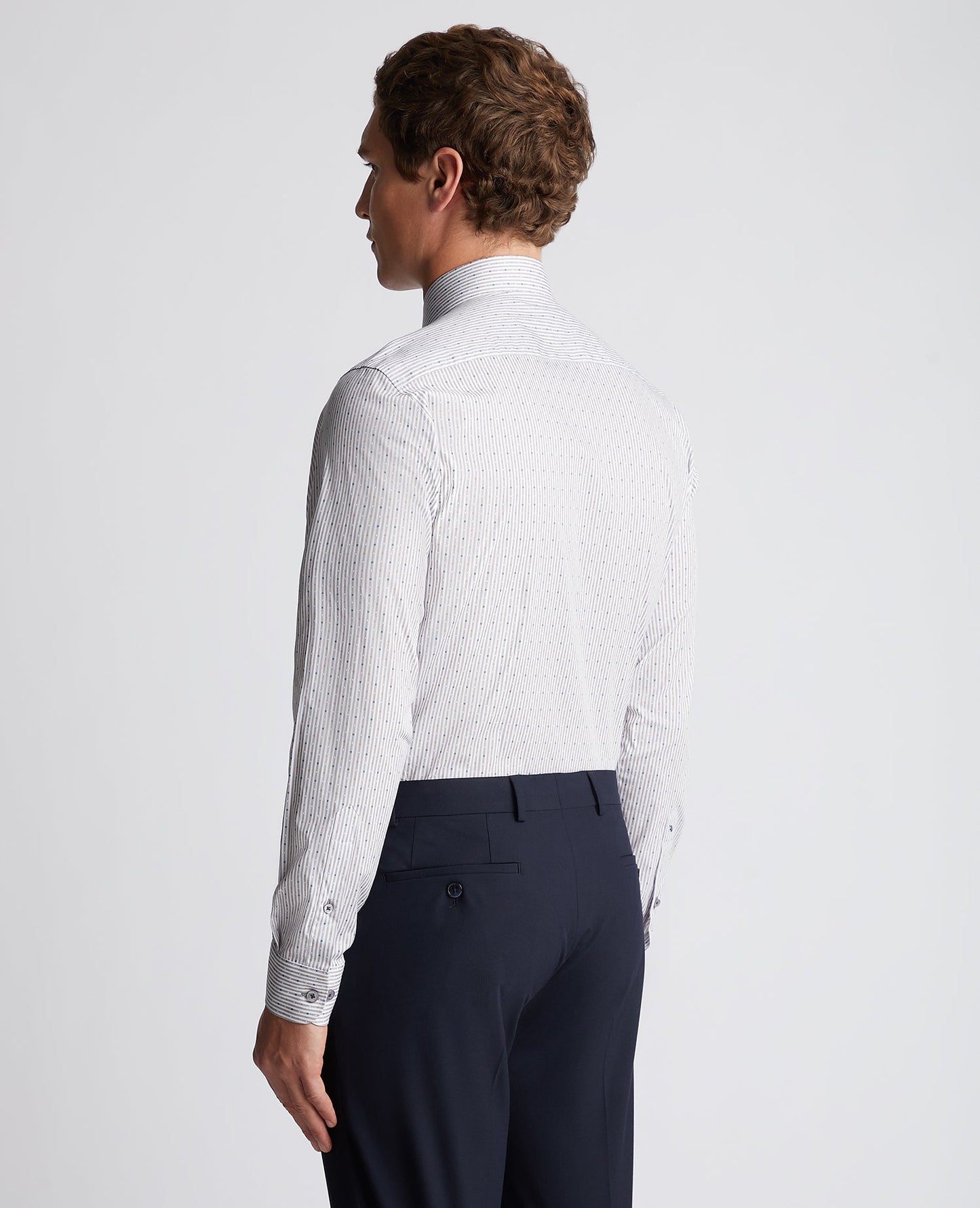 Man wearing a grey Tapered Fit Striped Cotton-Stretch Shirt