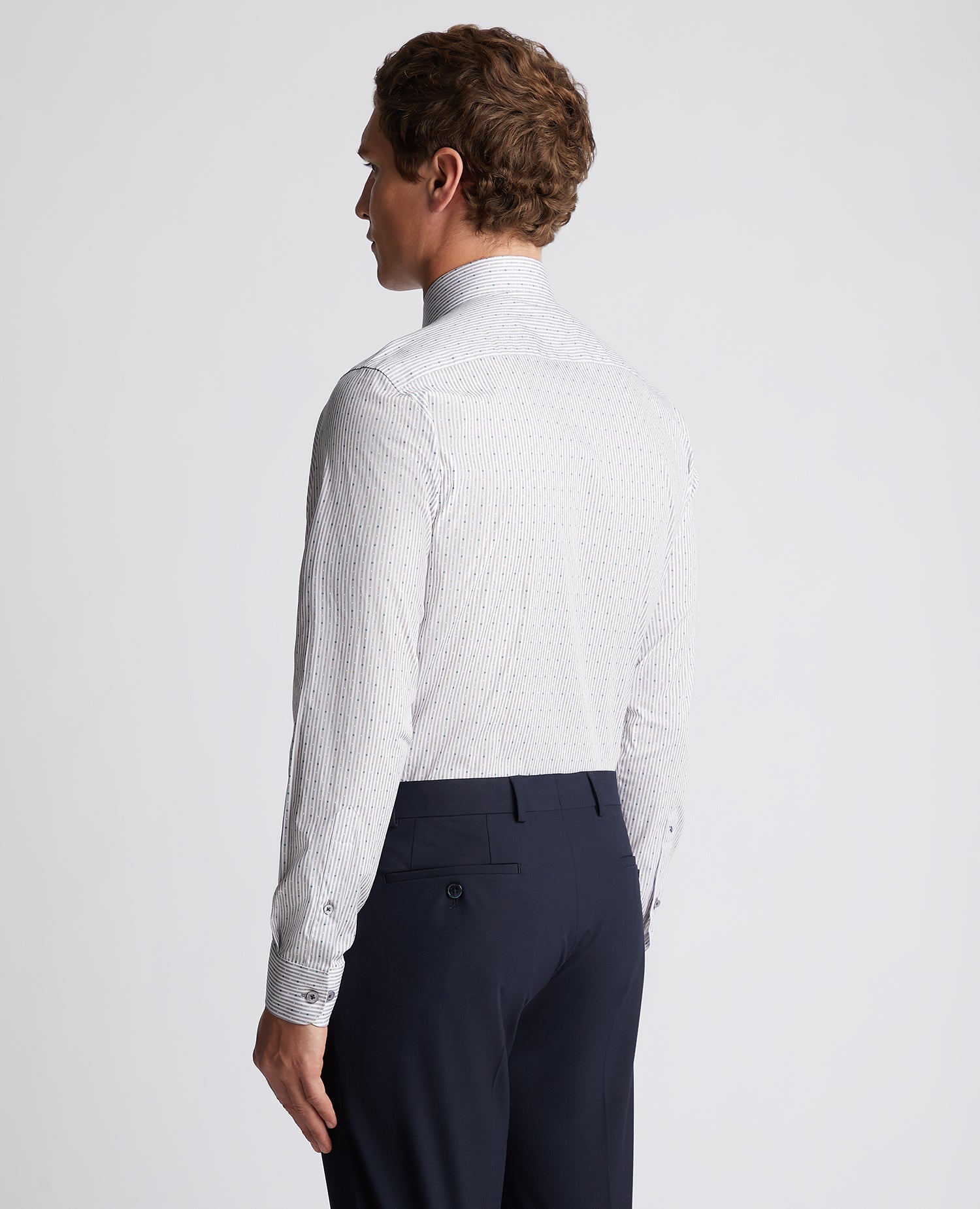 Man wearing a grey Tapered Fit Striped Cotton-Stretch Shirt