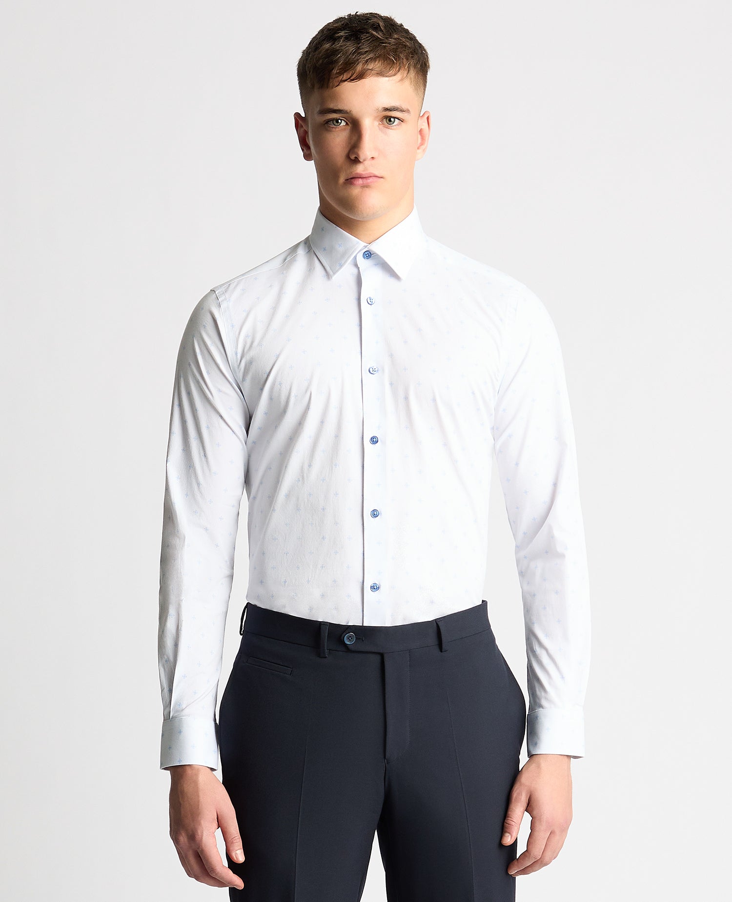 Man wearing a blue Tapered Fit Cotton Stretch Shirt
