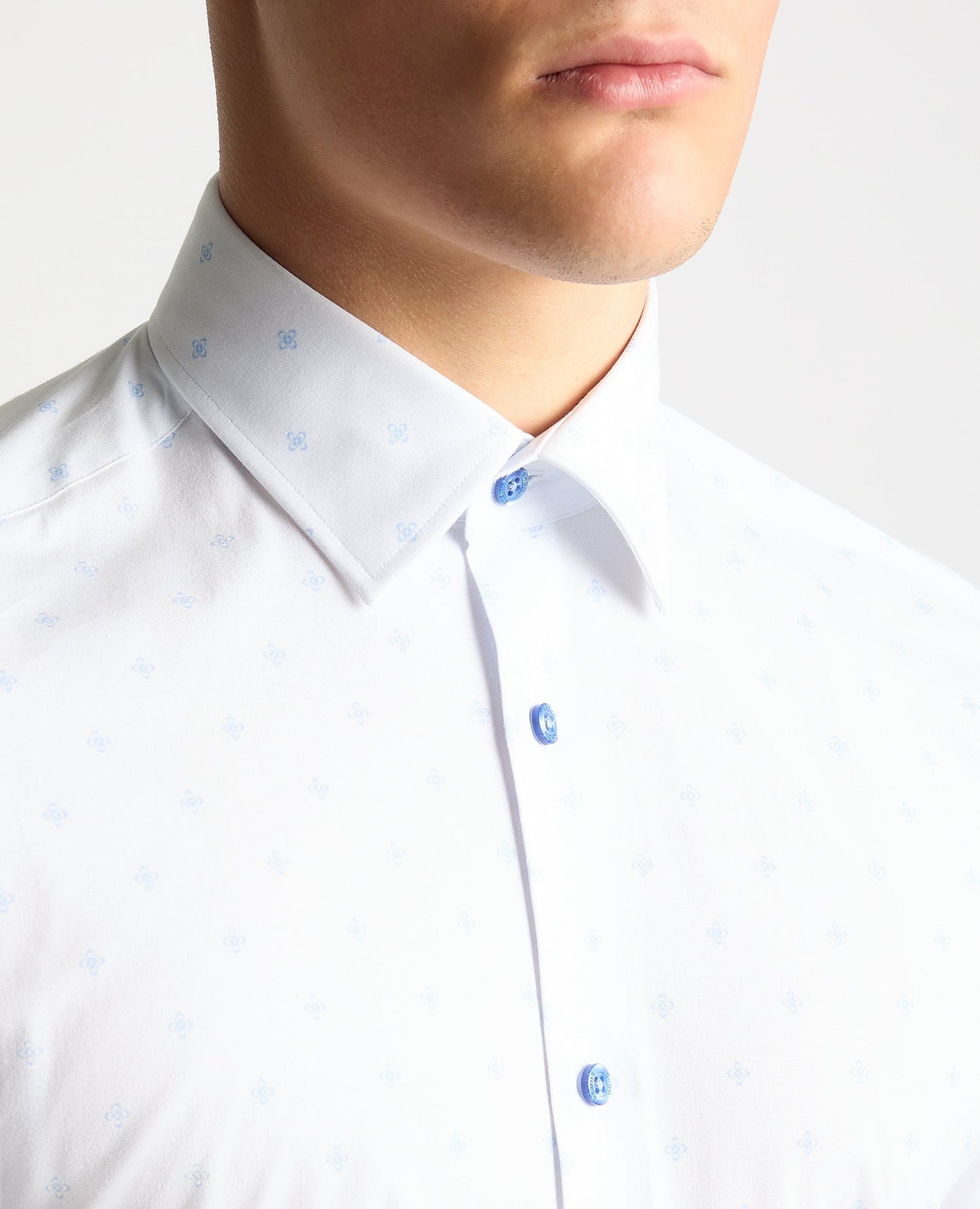 Man wearing a blue Tapered Fit Cotton Stretch Shirt