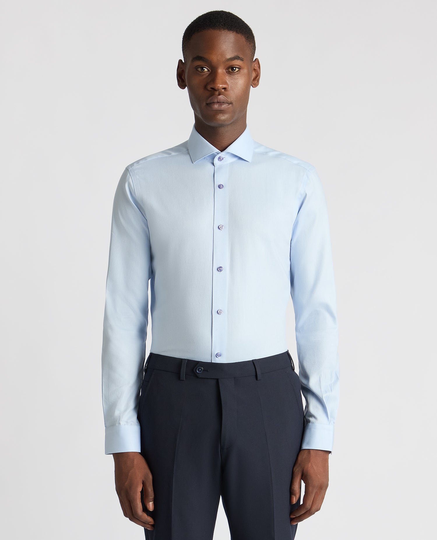 Man wearing a blue Slim Fit Cotton Twill Shirt