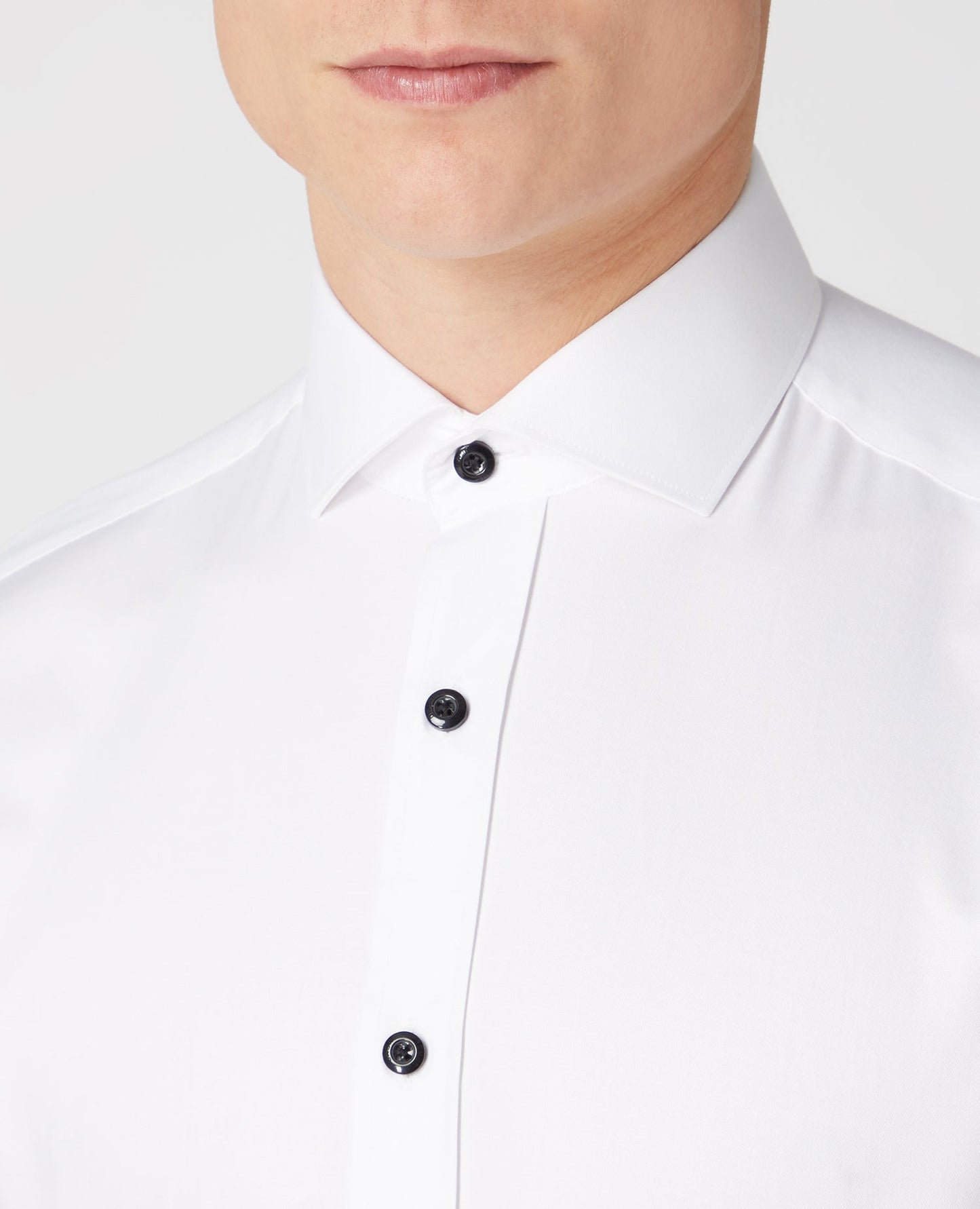 Man wearing a white Tapered Fit Cotton Shirt