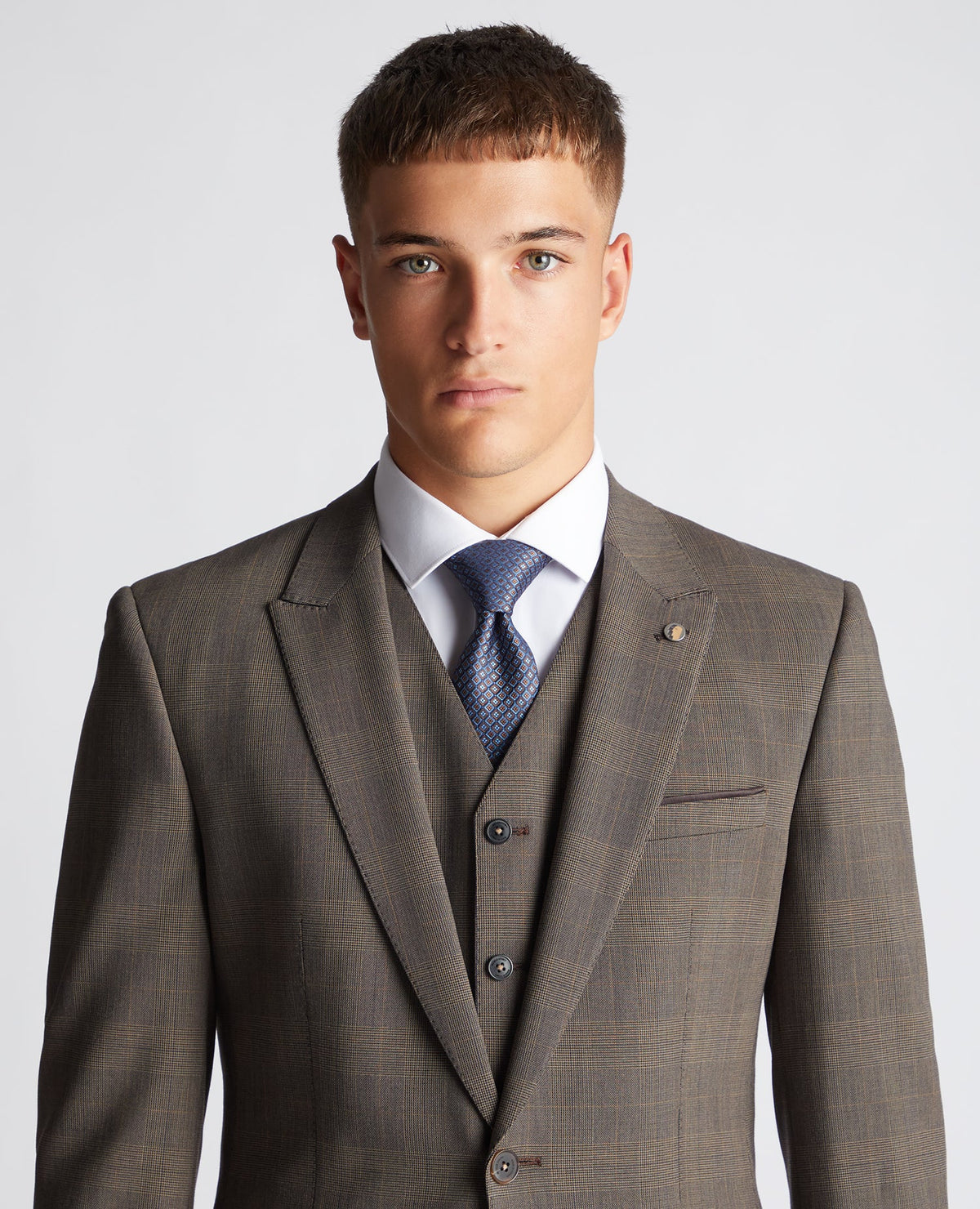Man wearing a brown Abstract Design Tie