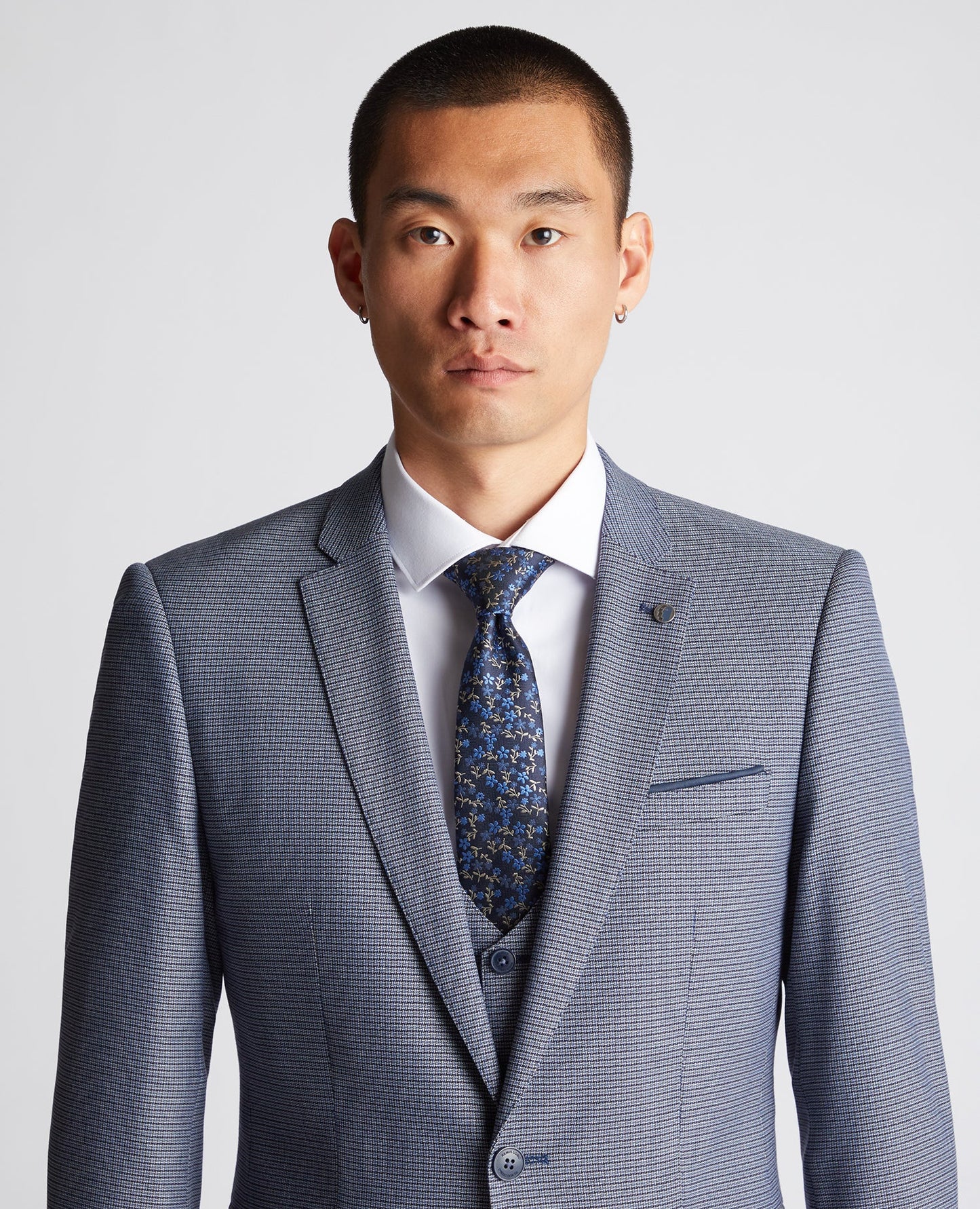 Man wearing a blue Floral Tie