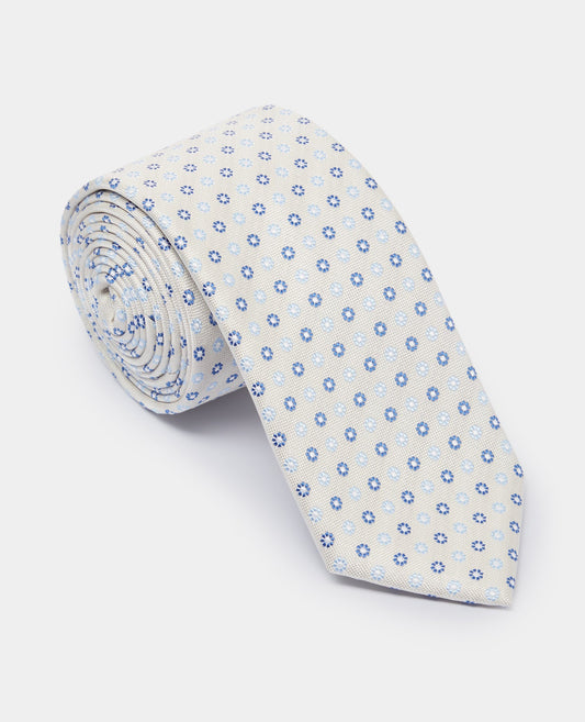 Man wearing a sand Micro Floral Design Tie