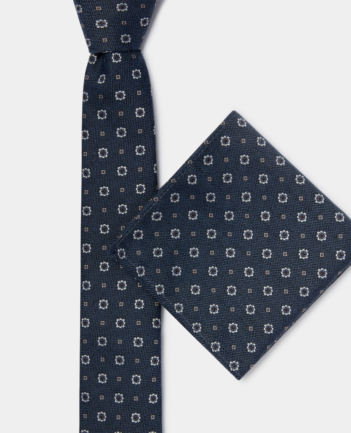 Man wearing a blue Geometric Floral Design Tie