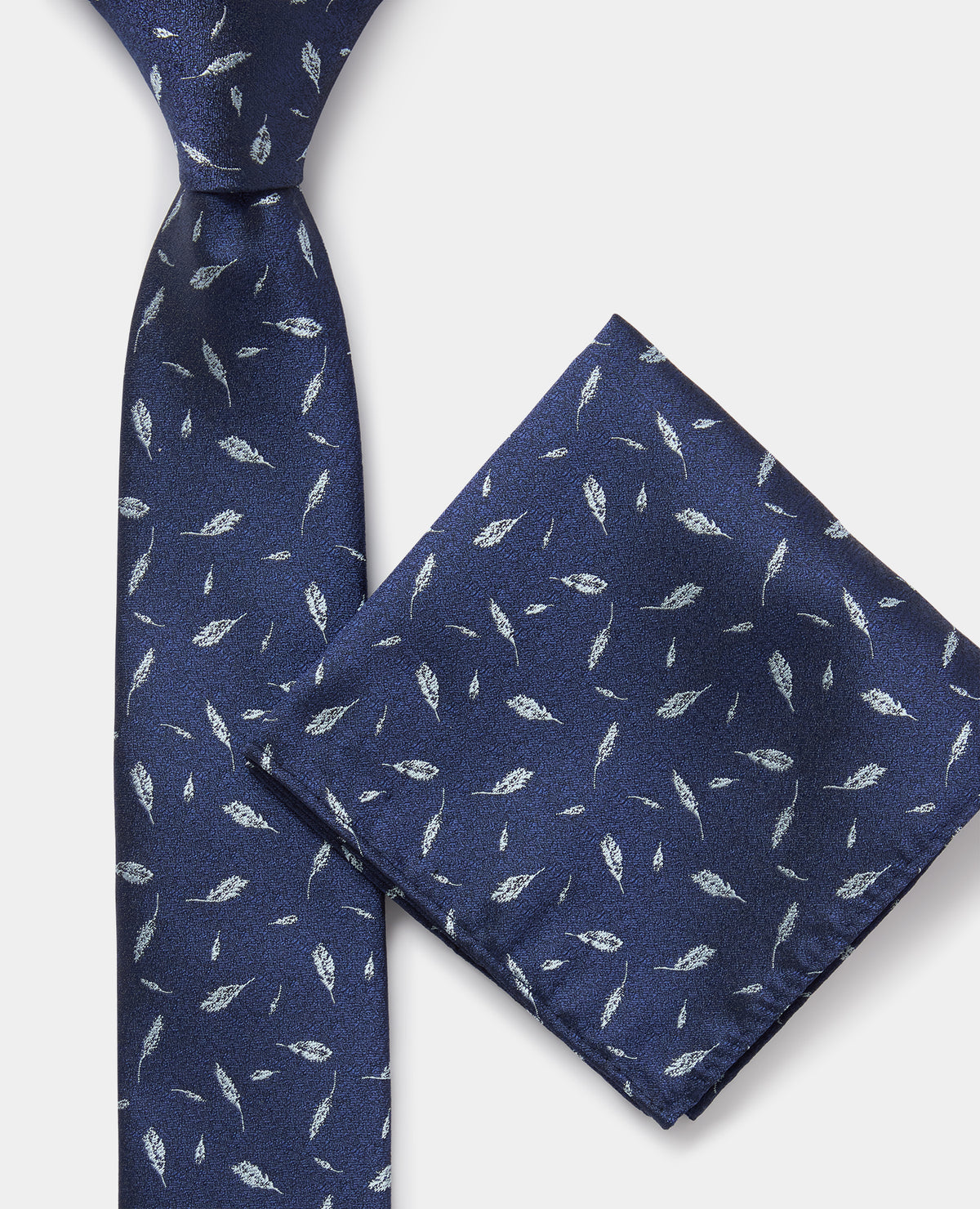 Man wearing a blue Leaf Print Tie