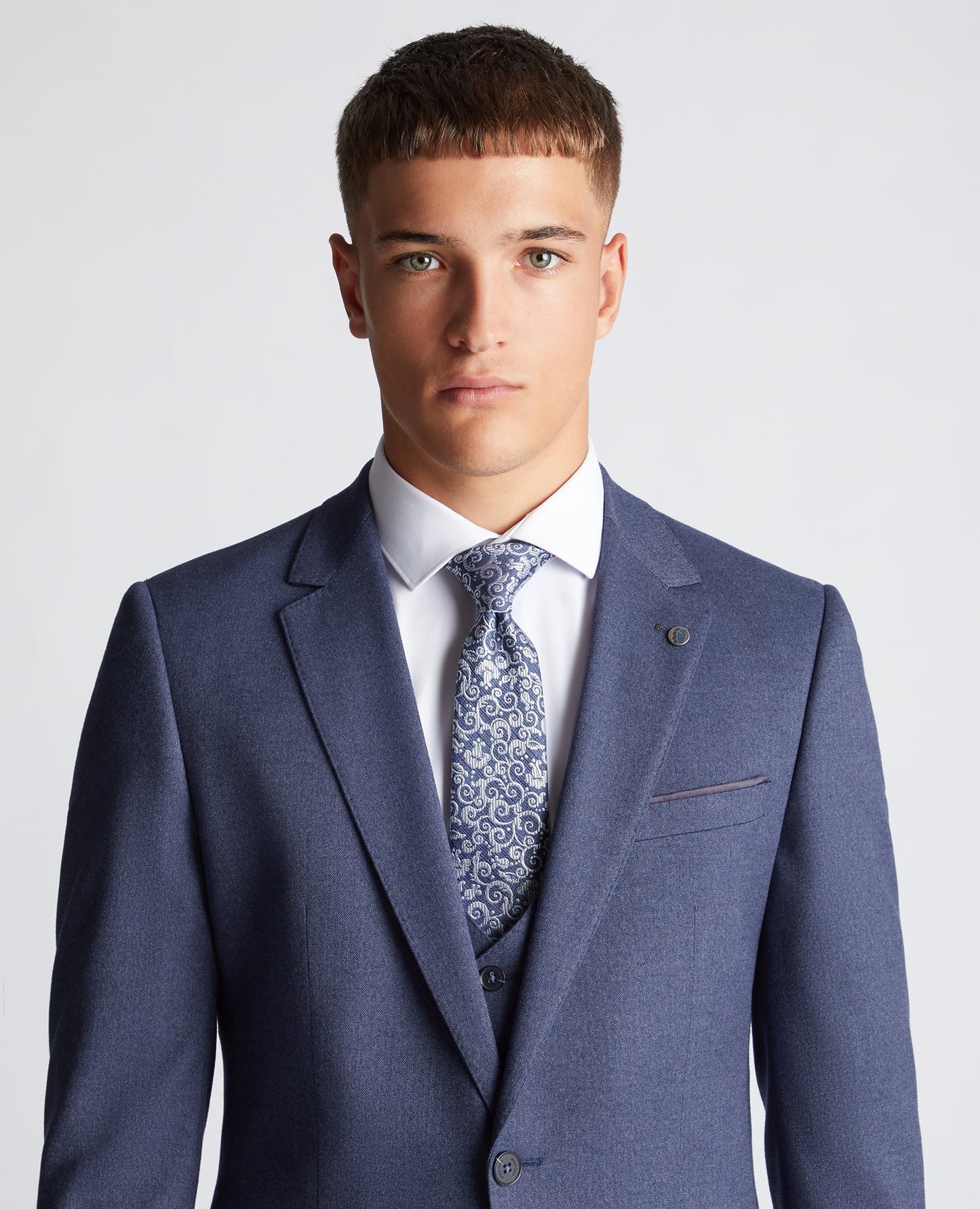 Man wearing a blue Floral Tie