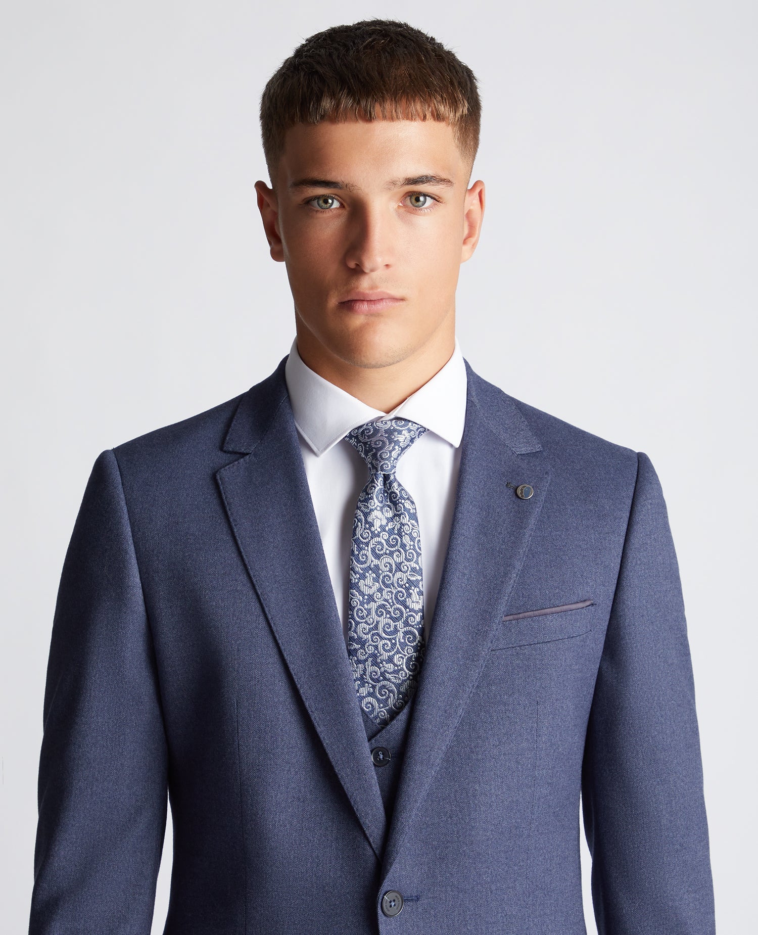 Man wearing a blue Floral Tie