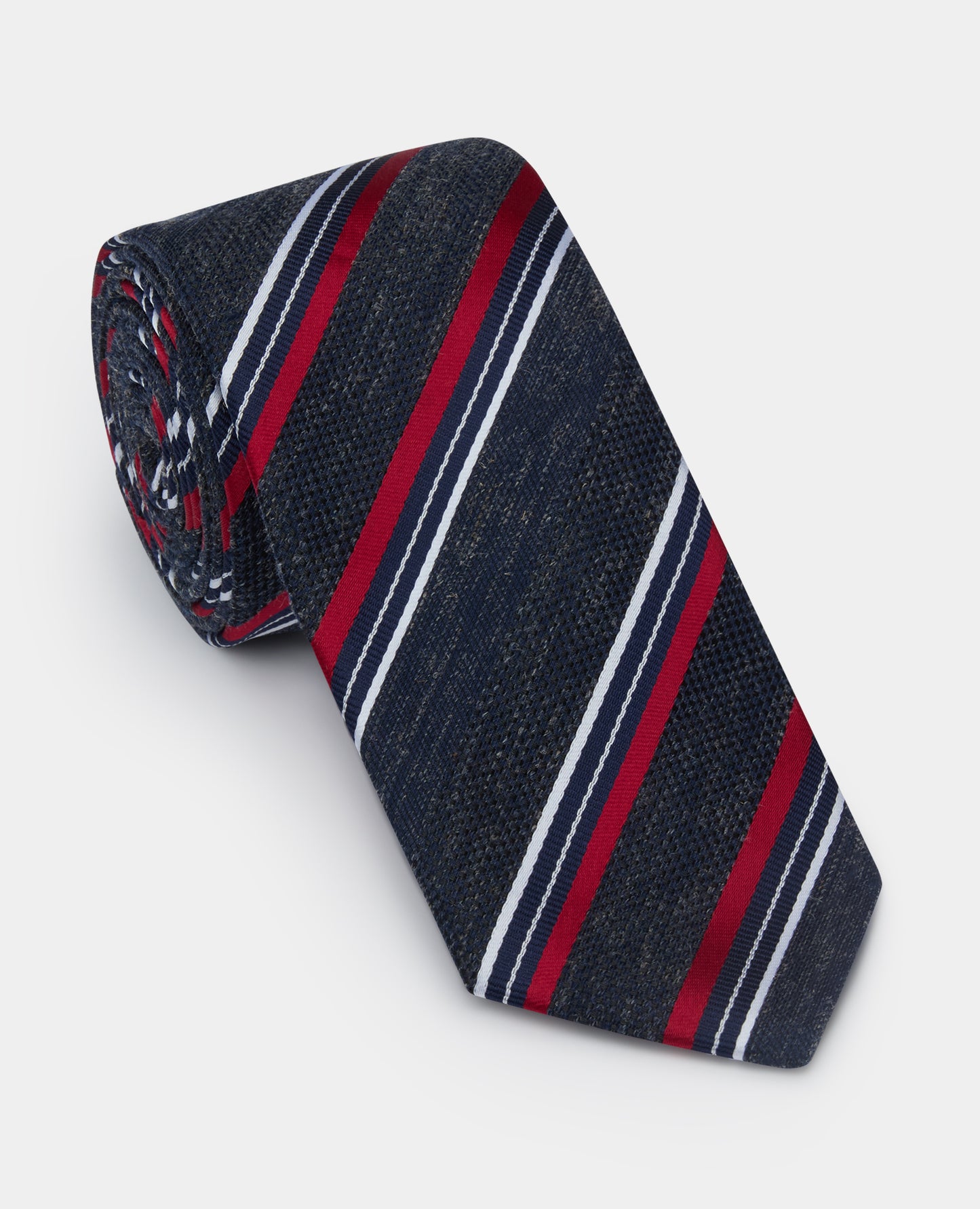 Man wearing a navy Stripe Design Tie