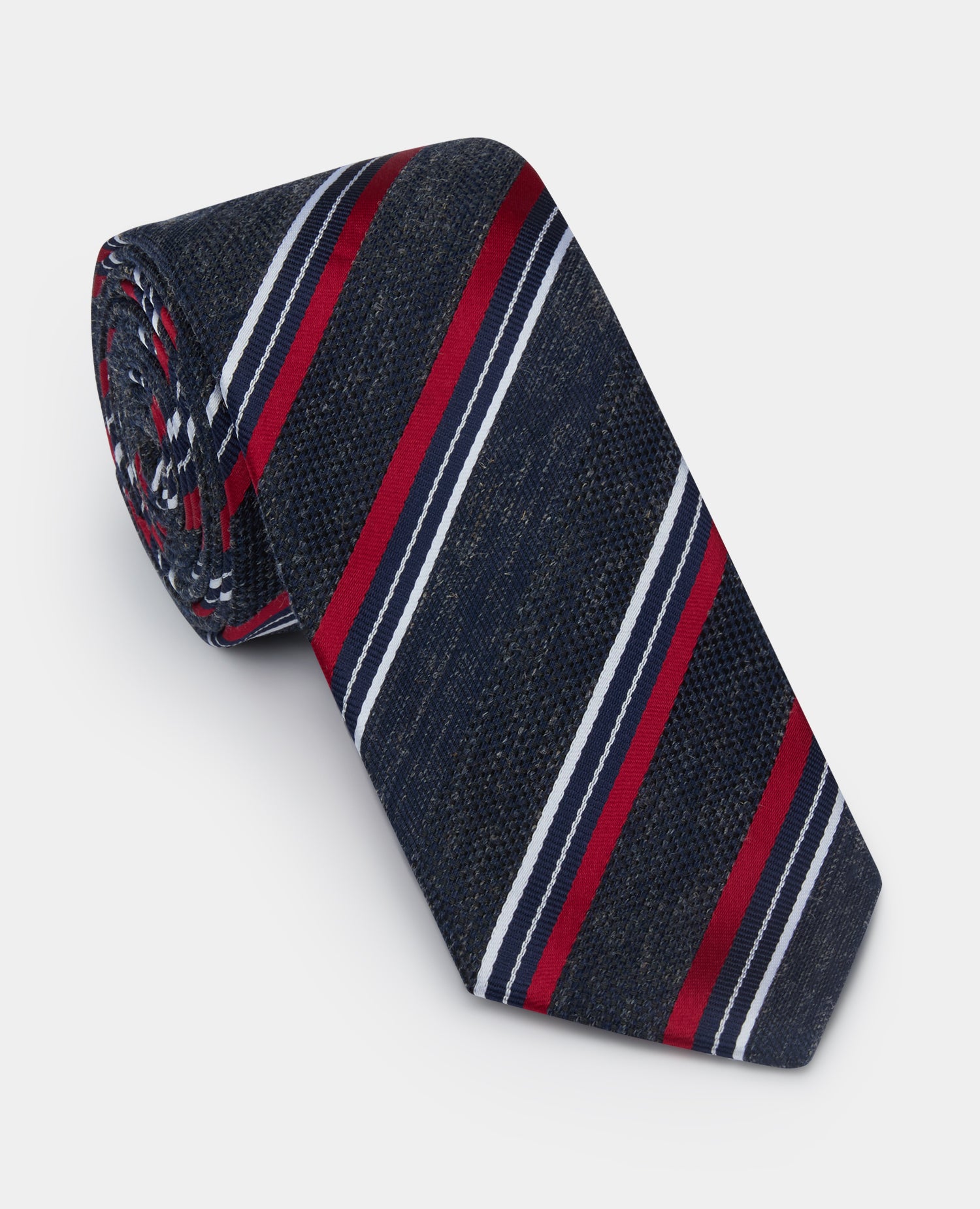 Man wearing a navy Stripe Design Tie